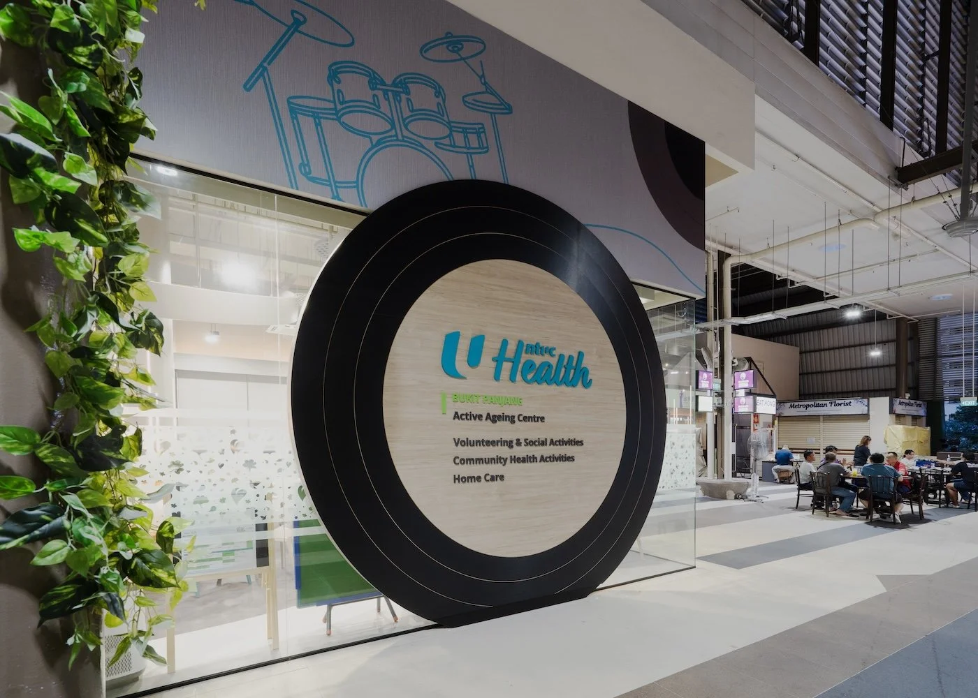 NTUC Health Active Ageing Centre @ Bukit Panjang nestled within a hawker centre