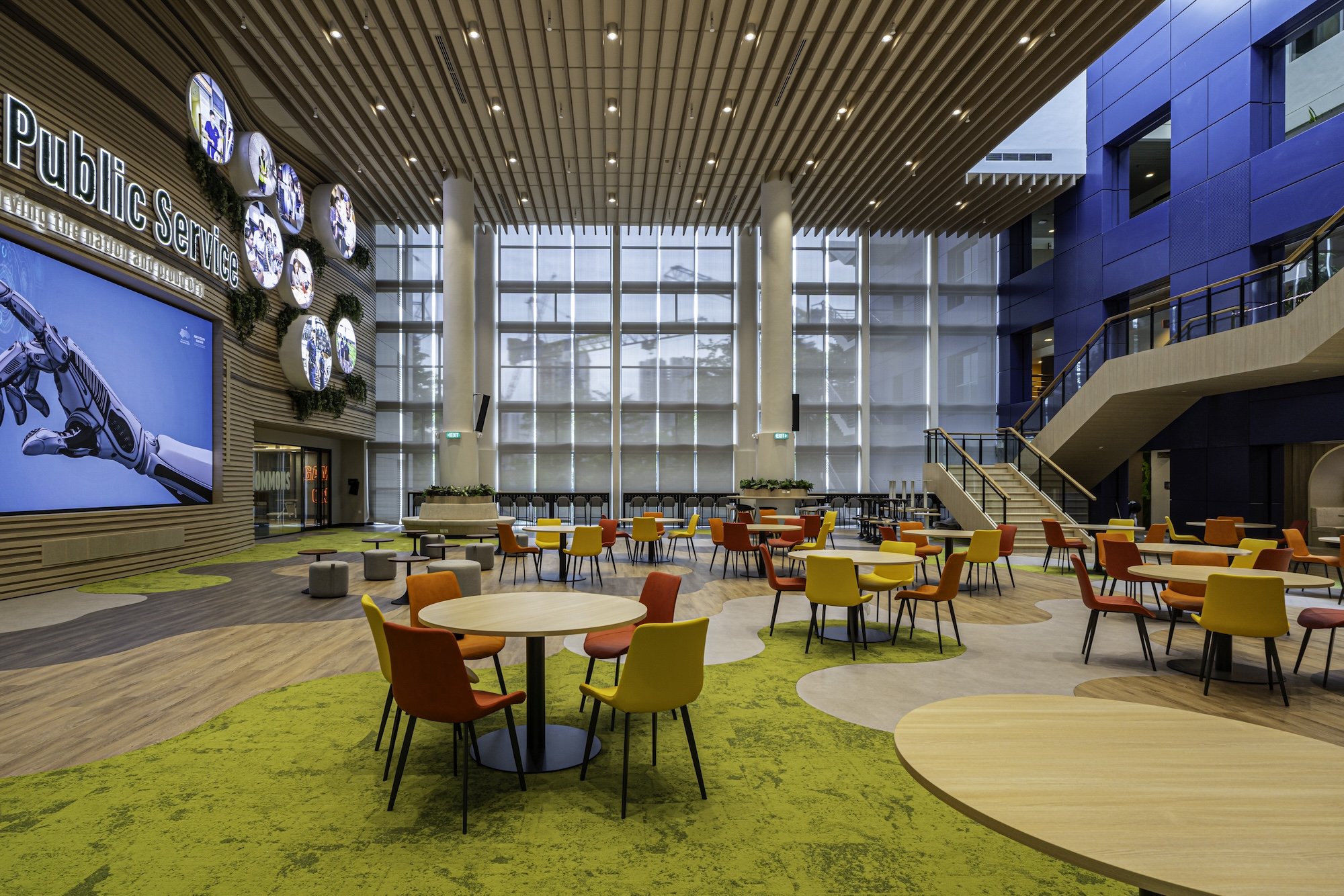 The redesigned Civil Service College atrium's biophilic design with bio-organic floor patterns inject a sense of vibrancy