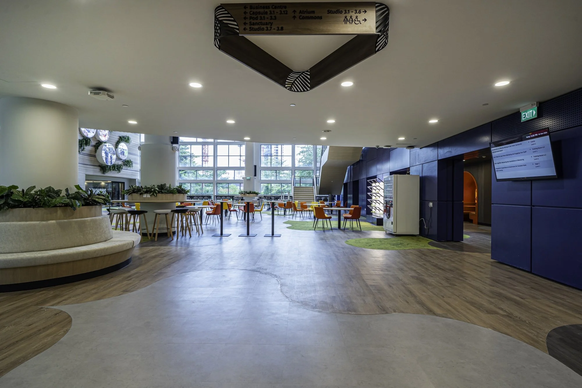 The redesigned Civil Service College atrium is welcoming and readily set up for TED Talks and buffet luncheon