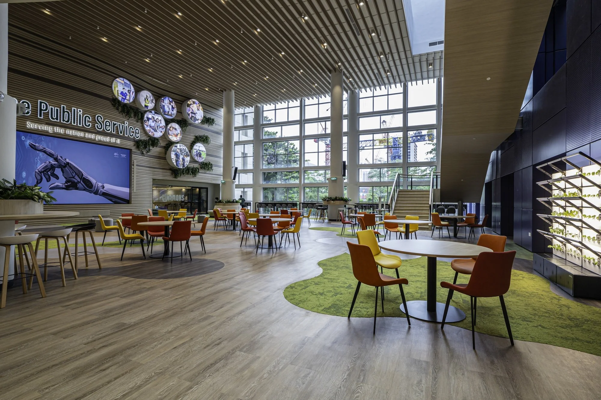 The redesigned Civil Service College atrium is retrofitted with sustainable planters to mirror Singapore's drive towards food sufficiency