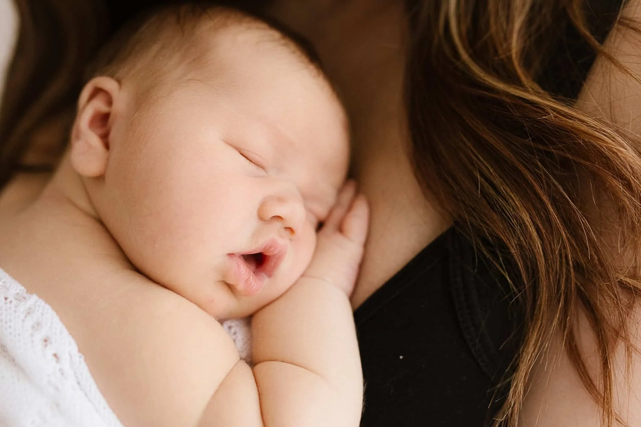 Chunky 3 week old newborn baby in the studio in Grampound for their newborn photoshoot in Cornwall