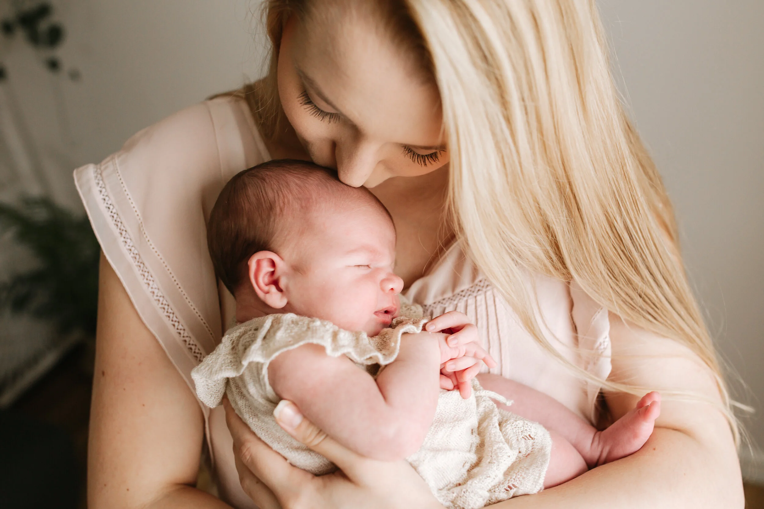 Sweet newborn baby Evie in the studio