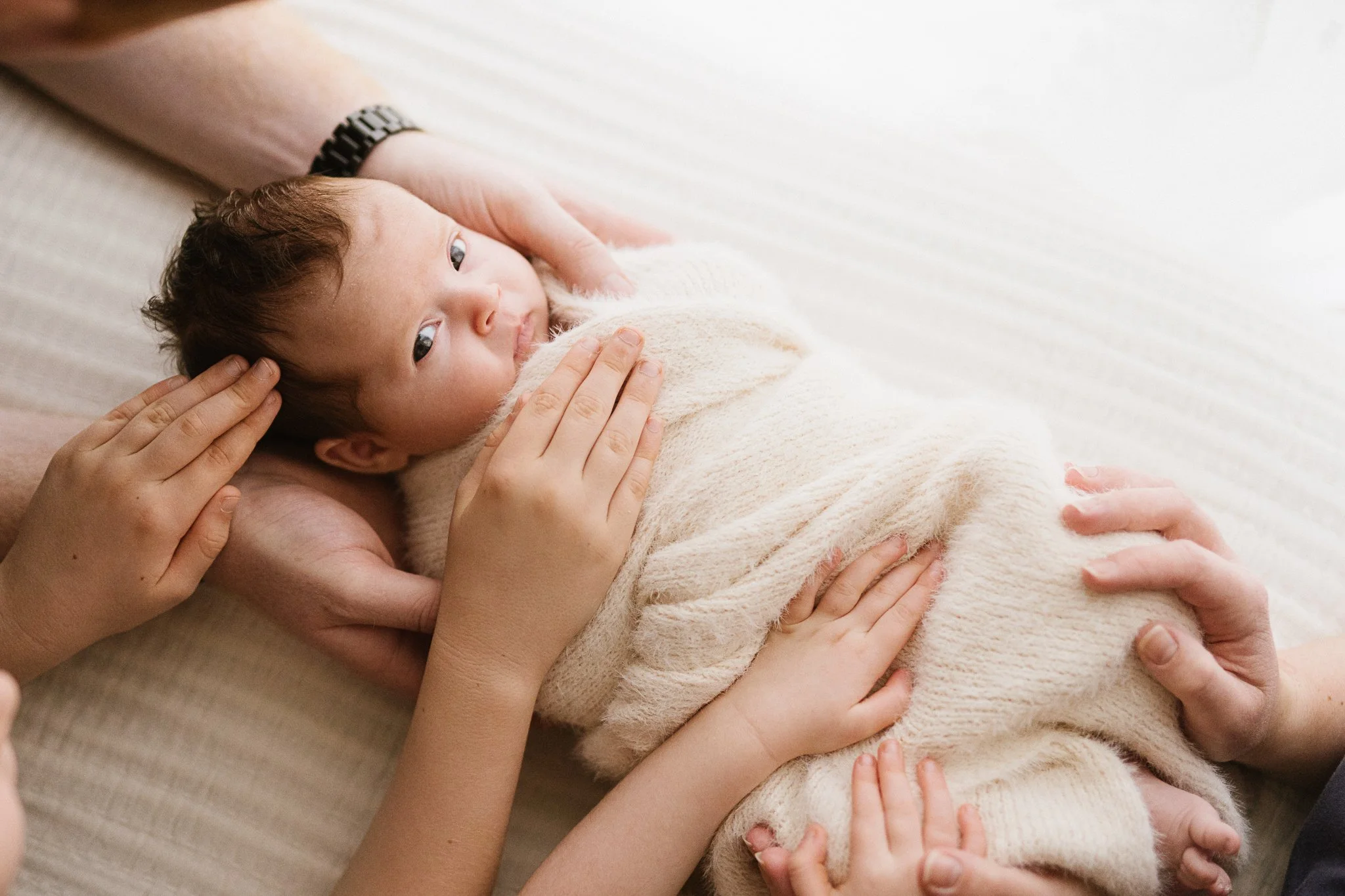 5 week old baby during older newborn photoshoot in Cornwall