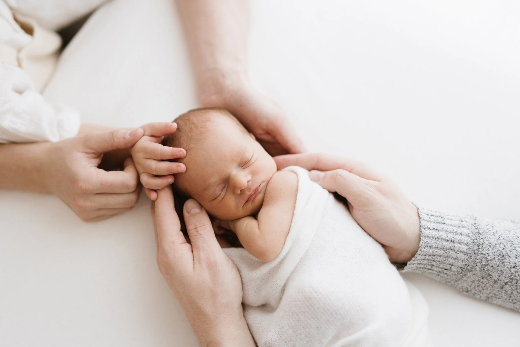 Tiny baby girl born premature, in for her newborn photoshoot in Cornwall