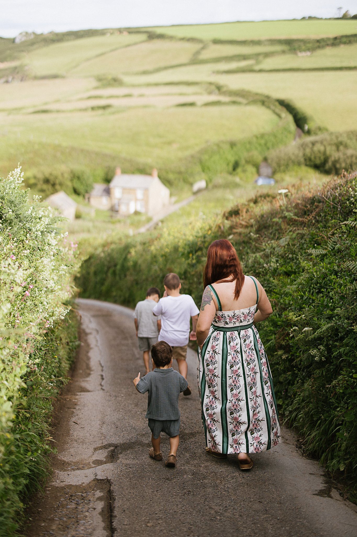 Heading down to the beach for an early morning session.  Earlier than was comfortable for the little ones, later than I would have preferred - for the light.  On the summer solstice, we were literally at the peak of these long days and awkward sessio