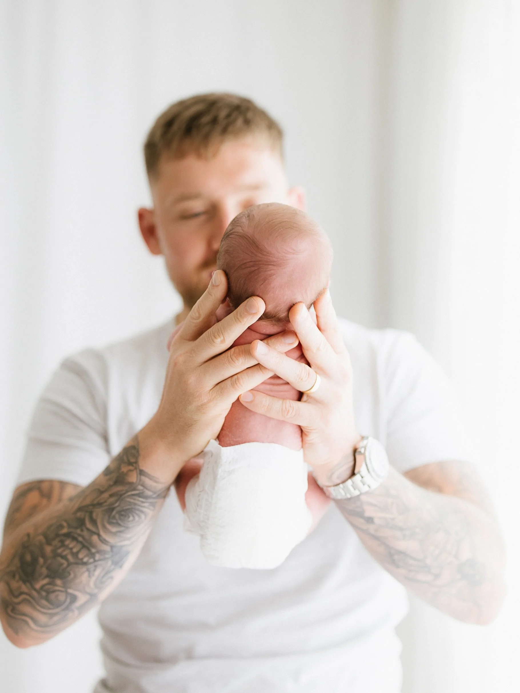 Love the newborn tuck and stretch, and looking so little in dad's big hands 😍

Don't you love how photography can capture such things?  We definitely take for granted these days what it means to have visual records of everything and I wonder if that
