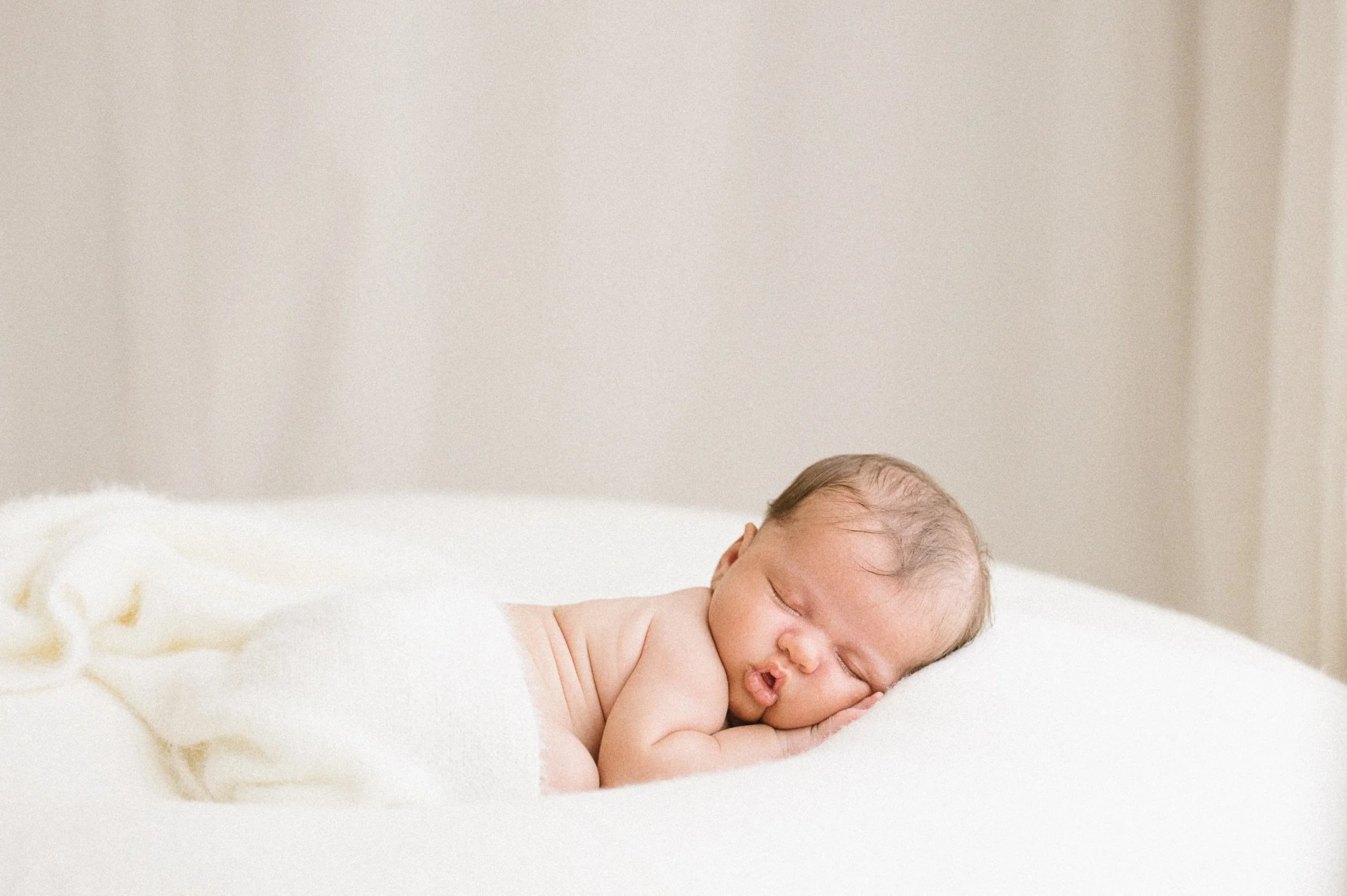 I am so out of synch with work and posting here, it's not intentional! I've been literally swooning as I edit some of my later summer sessions but also loving the thought of more cosy newborn shoots in the weeks ahead.

Like this gorgeous little one,