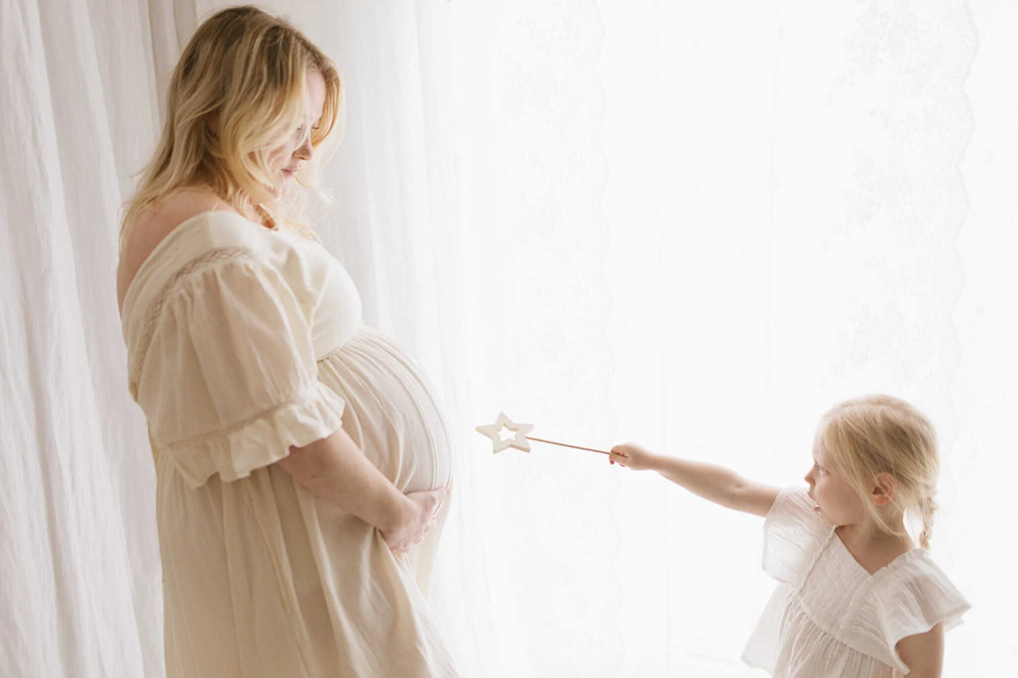 Mother and daughter in natural light maternity photography session in Cornwall