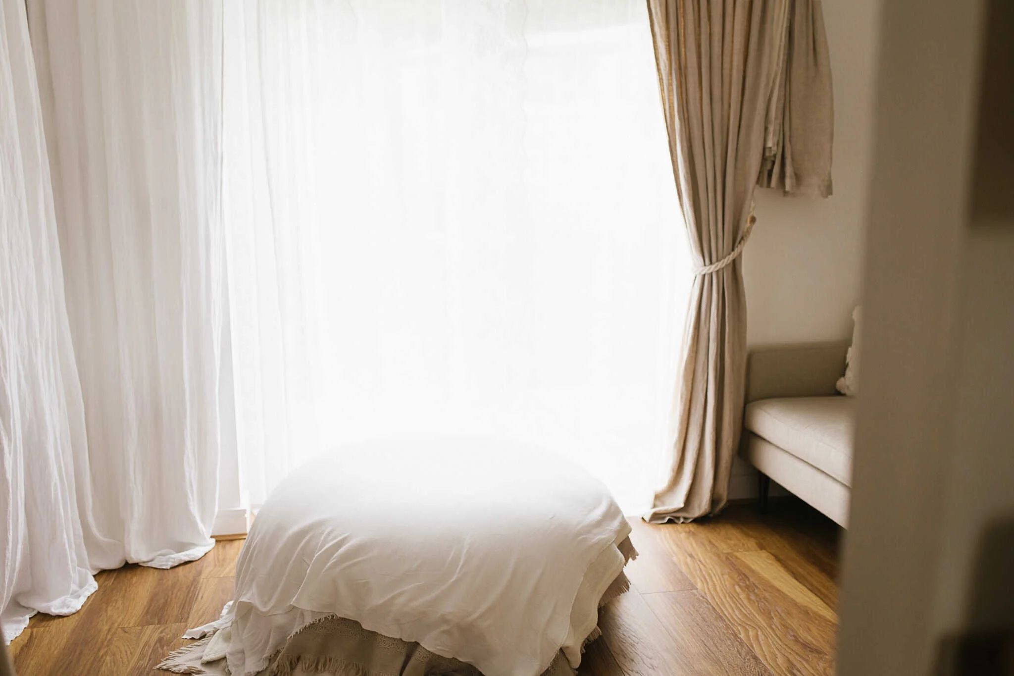 Natural light newborn photography studio in Grampound Cornwall, neutral tones and simple setup