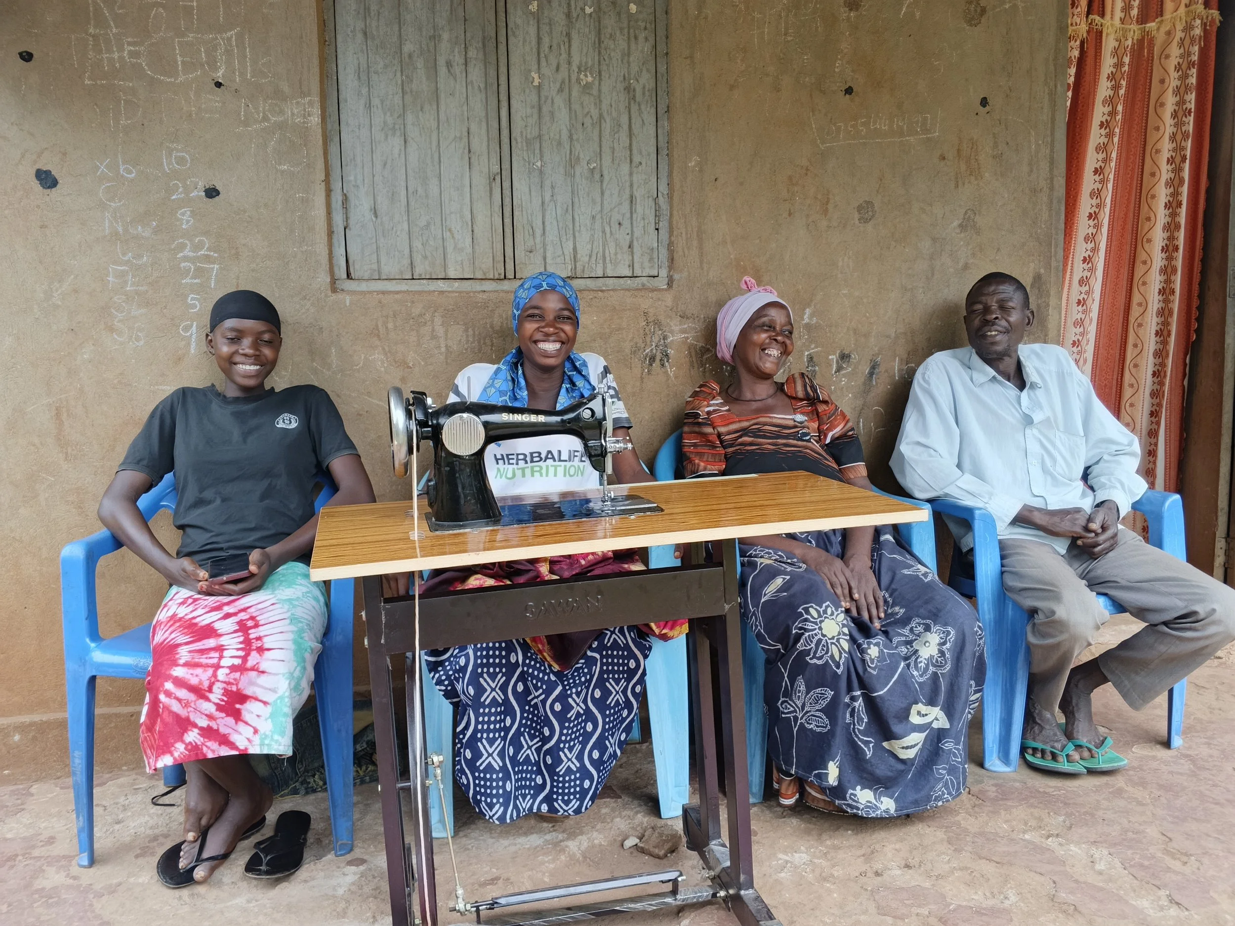 Woman gaining tailoring skills