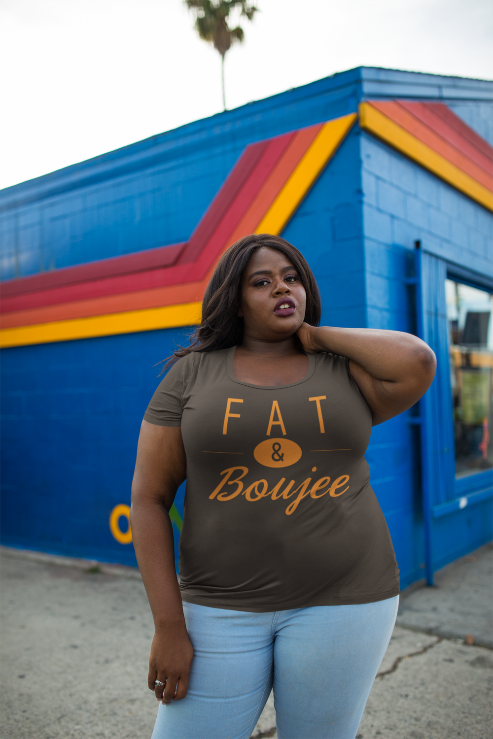 plus-size-round-neck-t-shirt-mockup-featuring-a-woman-outside-a-blue-and-orange-store-18295+%285%29.png