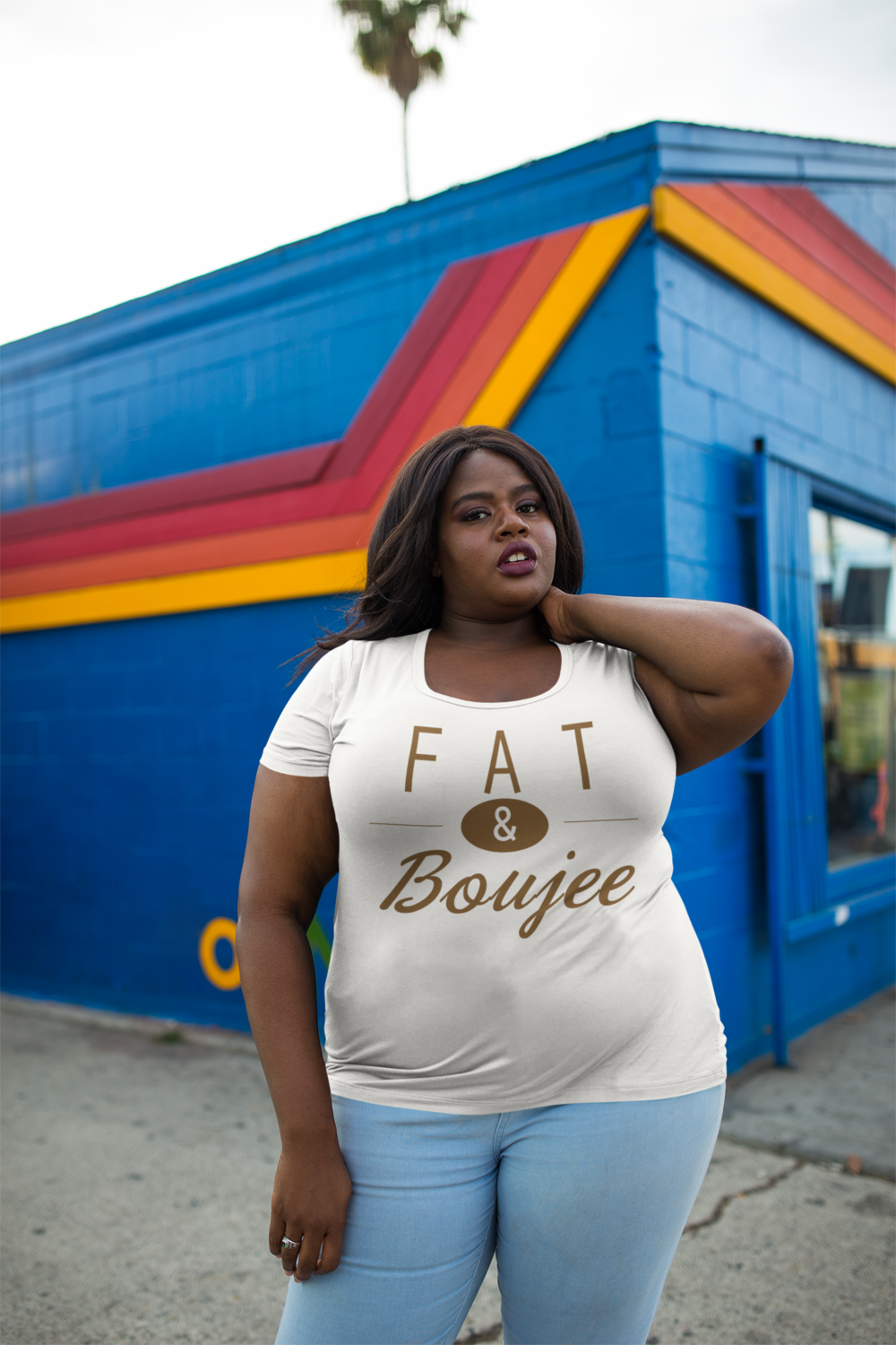plus-size-round-neck-t-shirt-mockup-featuring-a-woman-outside-a-blue-and-orange-store-18295+%283%29.png
