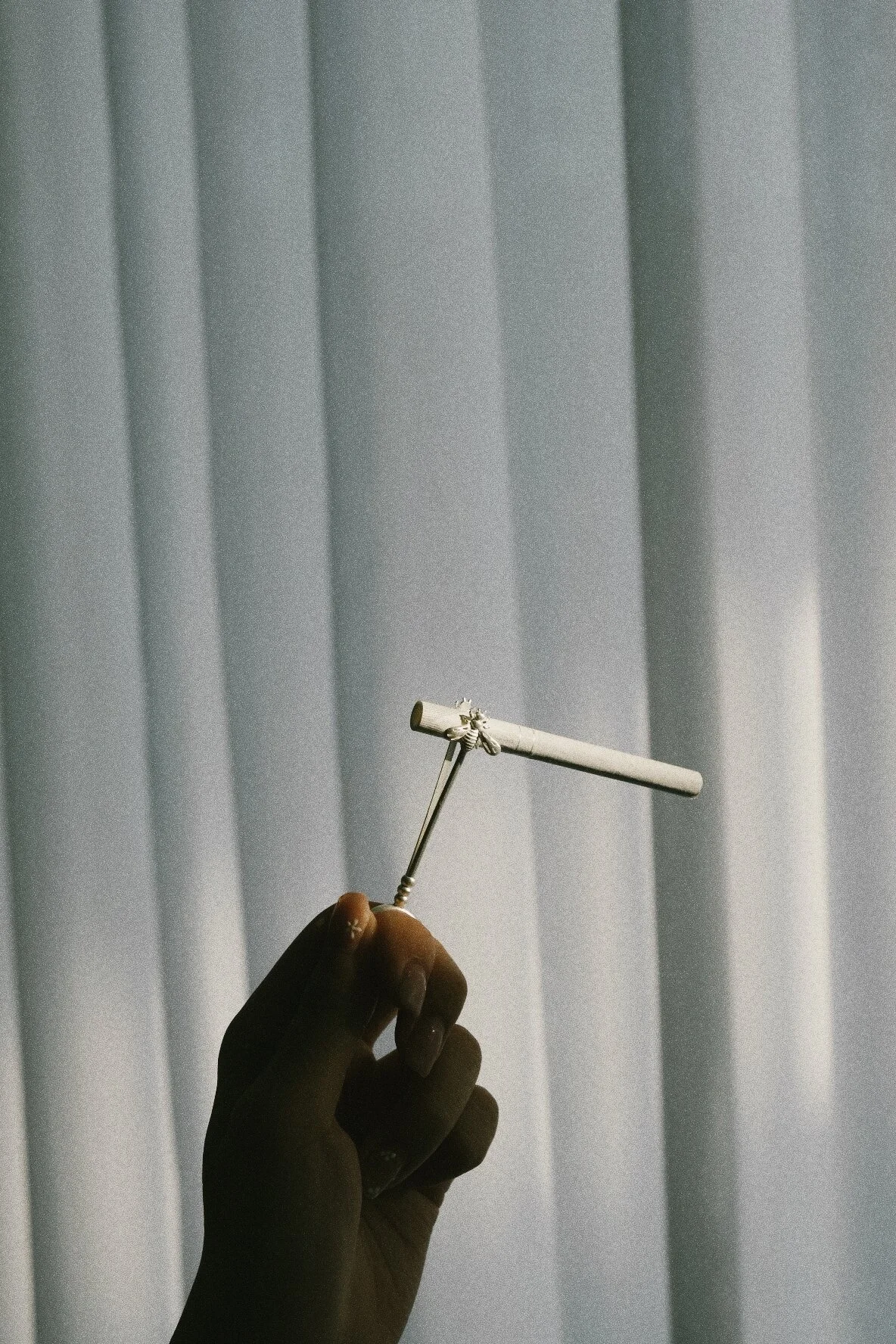 Queen Bee cigarette/roach clip