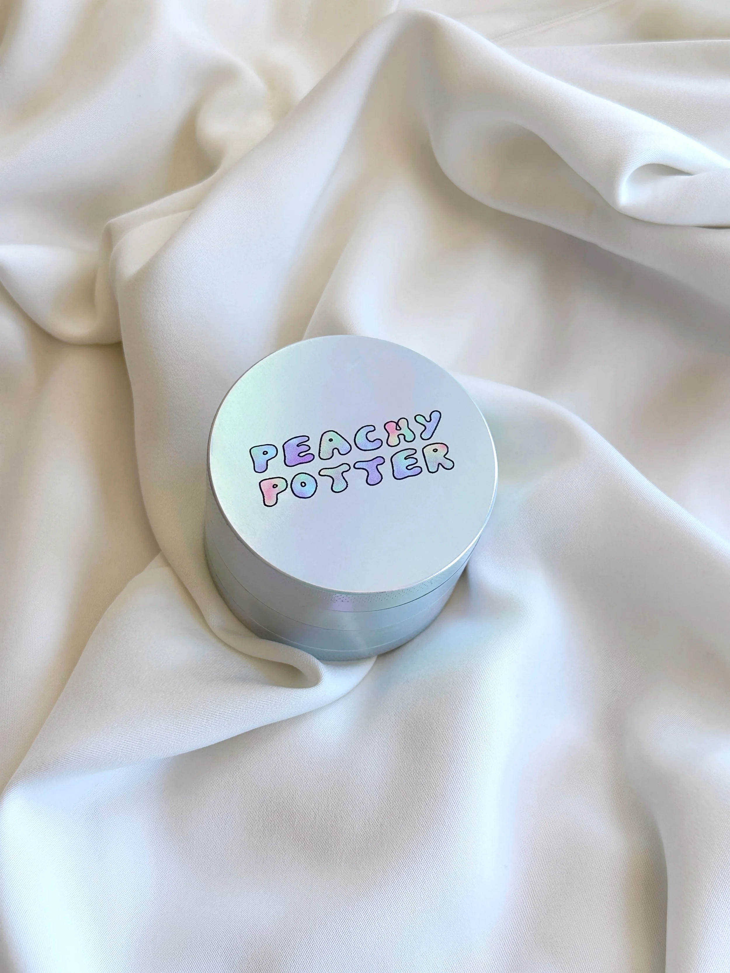 Peachy Potter lilac iridescent 4 piece herb grinder