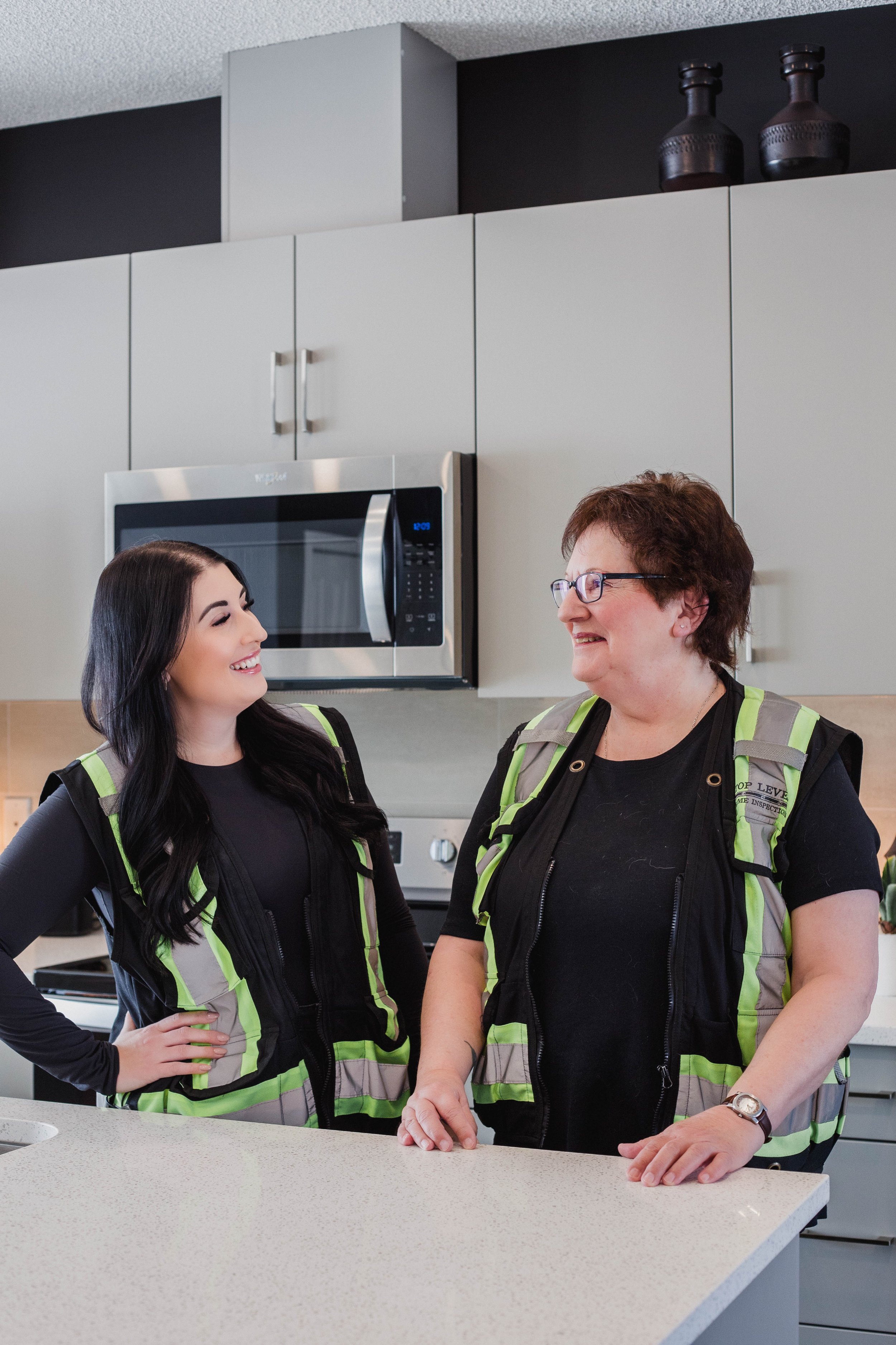Construction quality assurance specialists conducting new-build inspections in Calgary