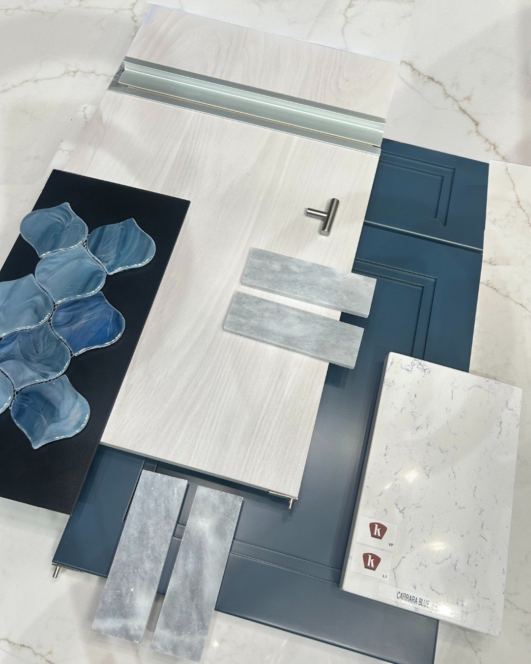 "Mother of Pearl"

This cool-toned mood board was the calming, oceanic influence we needed for this mood board Monday.
