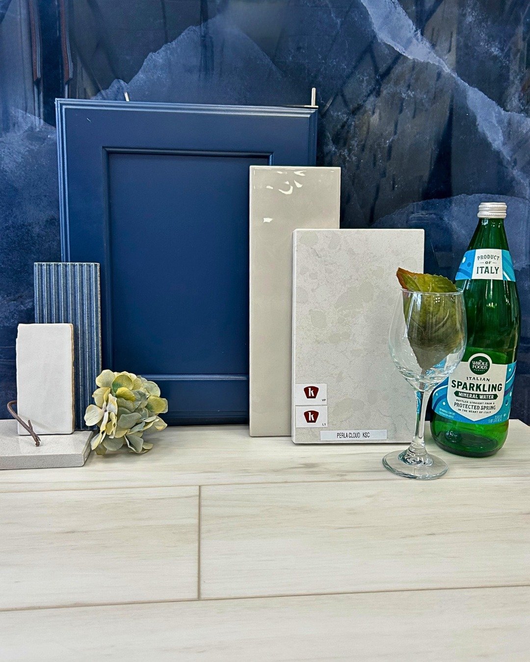 "Onyx Storm"

Todays mood board features a dramatic arrangement mixing bold cooler blues and warmer beige hues. The featured door is from Tedd Wood Fine Cabinetry's Landmark series in the color Naval. The stunning blue backdrop is actually 