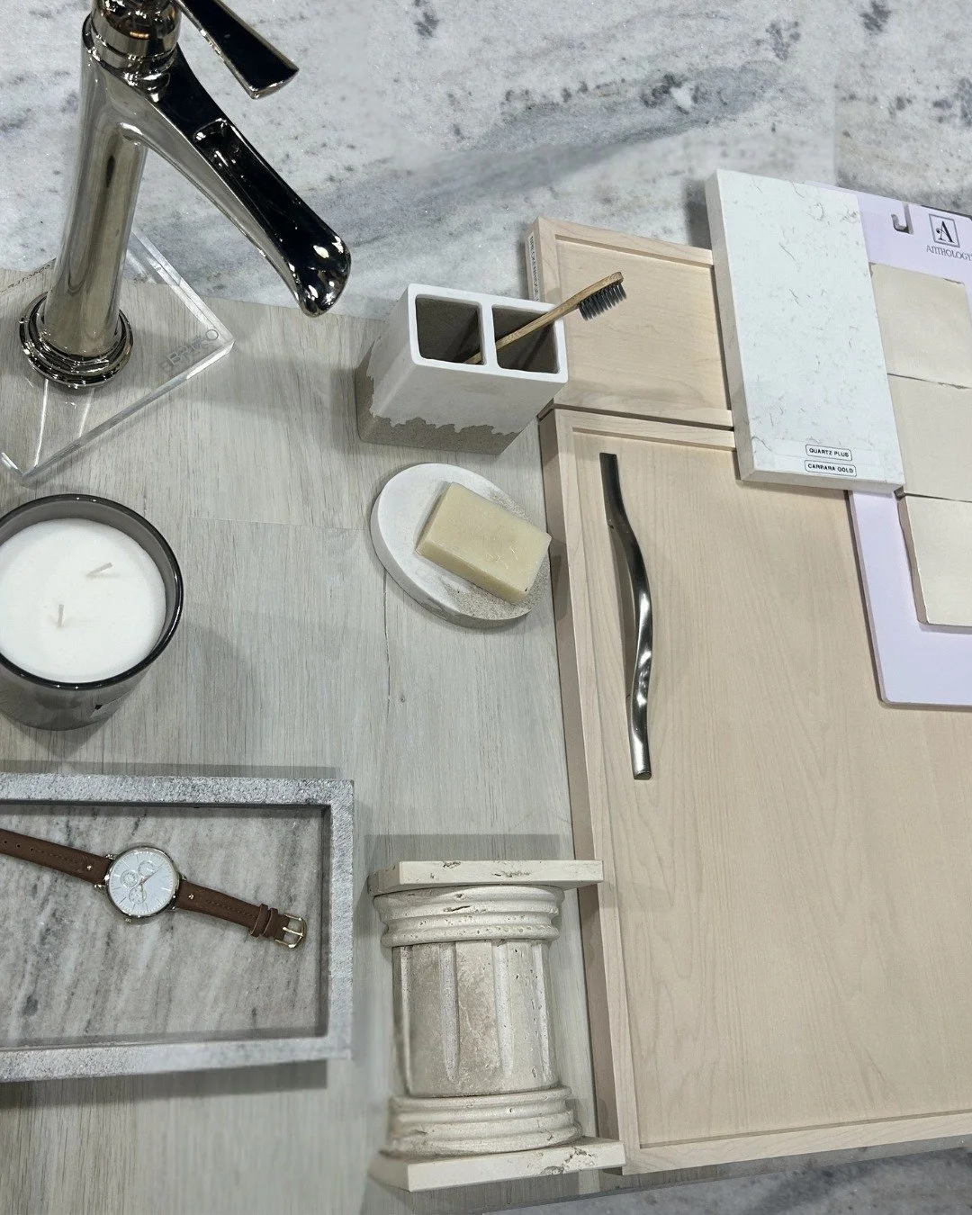 Today's mood board features an elevated aesthetic with classic elements like marble decor and countertops, light wash flooring and warm, cream tones.