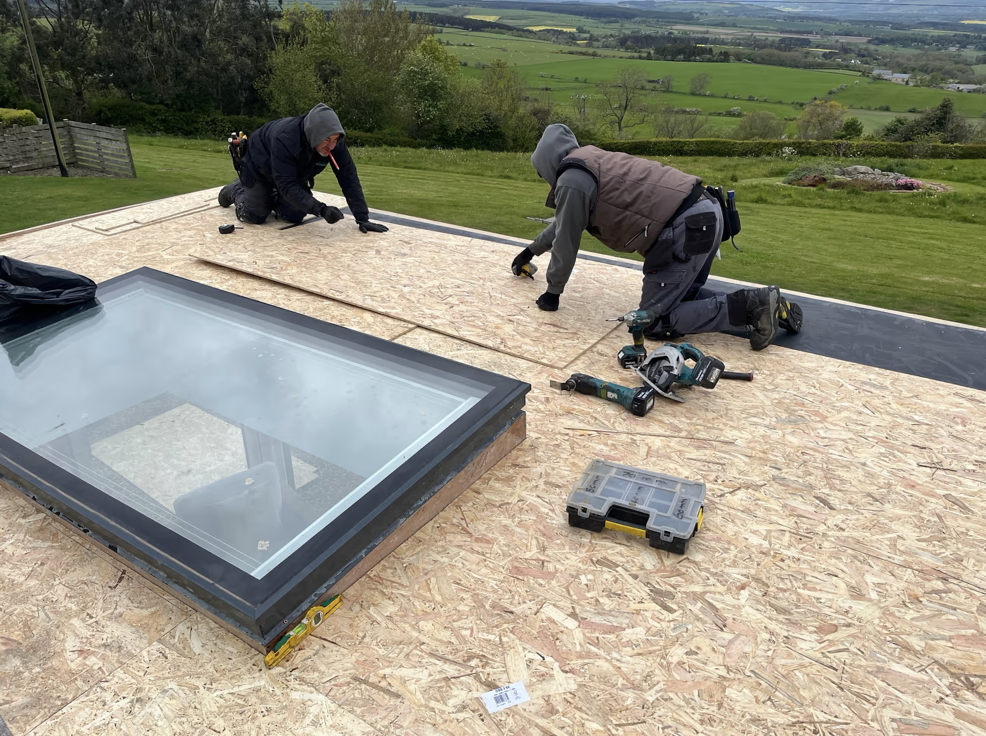 Sun room EPDM rubber roof replacement in Whittonstall — badly fitted roof corrected, internal drain removed, new box gutter outlet