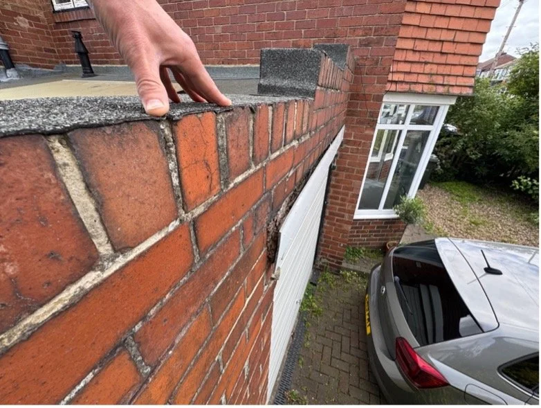 Garage flat roof replacement with new lintel and rebuilt parapet wall, Kenton, Newcastle — EPDM overlay cold deck