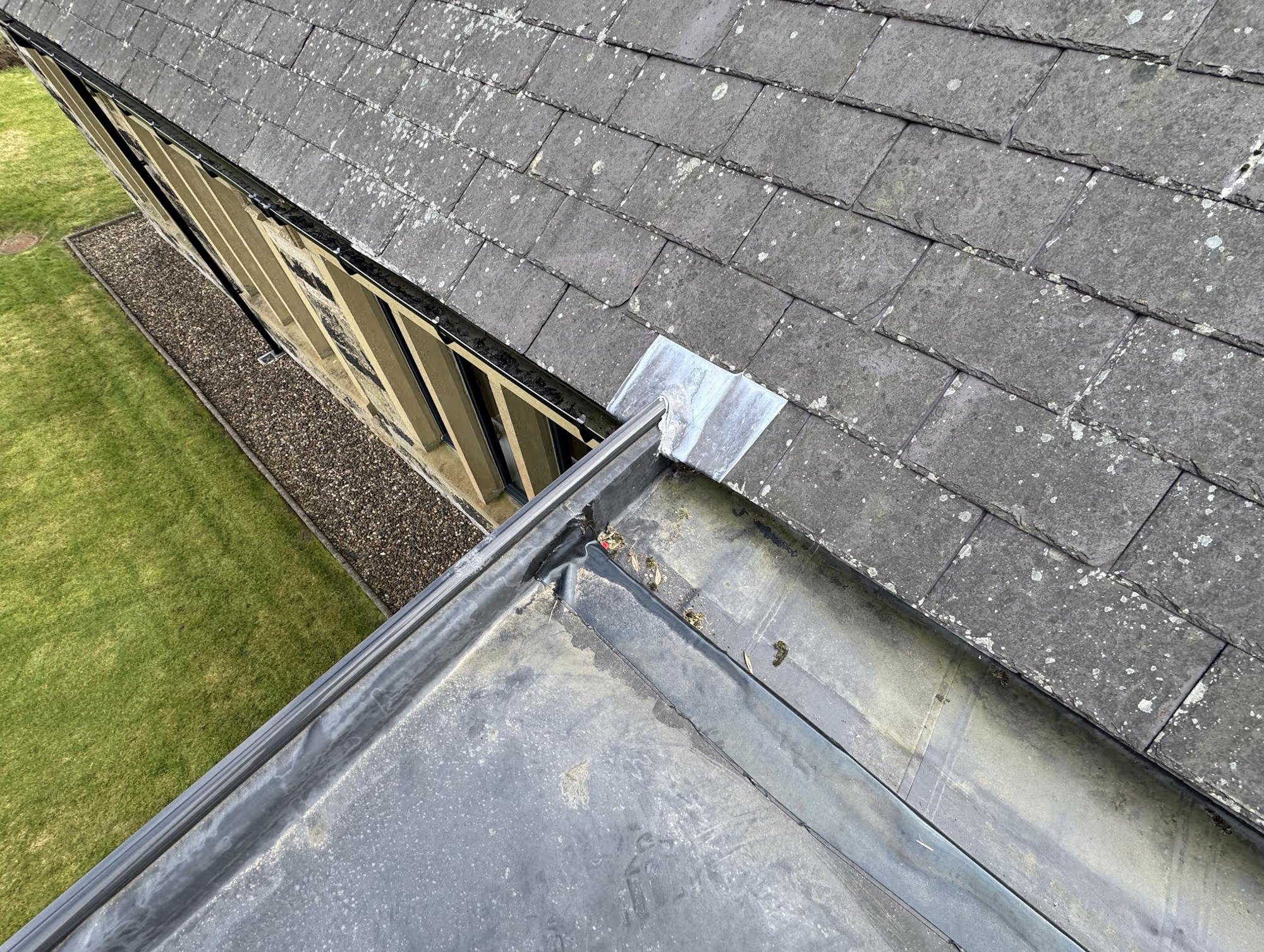 Sun room EPDM rubber roof replacement in Whittonstall — badly fitted roof corrected, internal drain removed, new box gutter outlet
