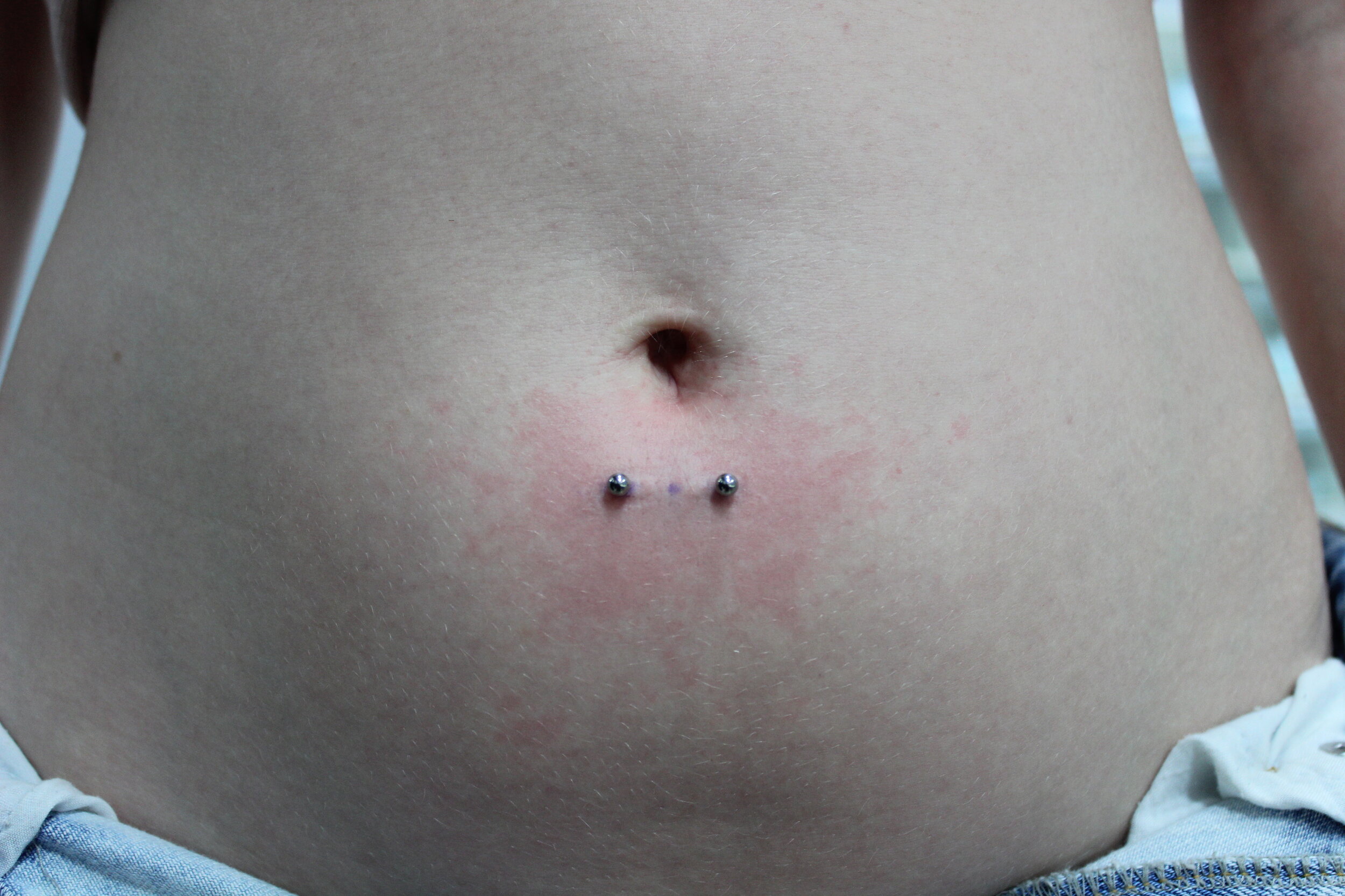 horizontal belly piercing.JPG