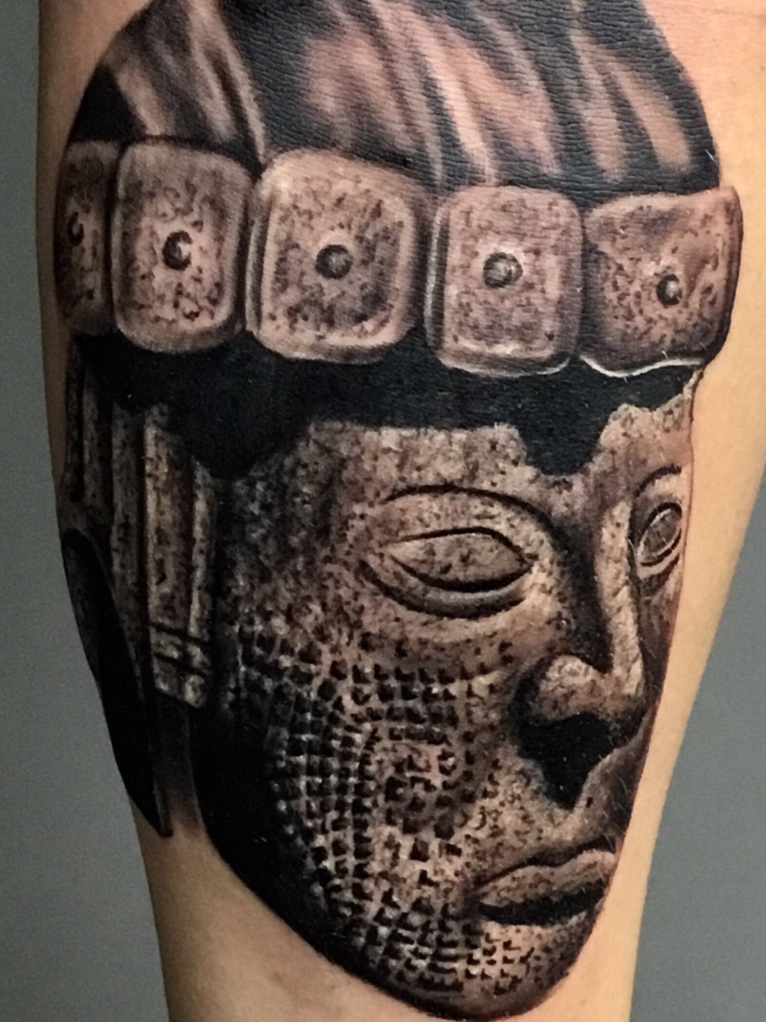 stone+face+tattoo.jpg