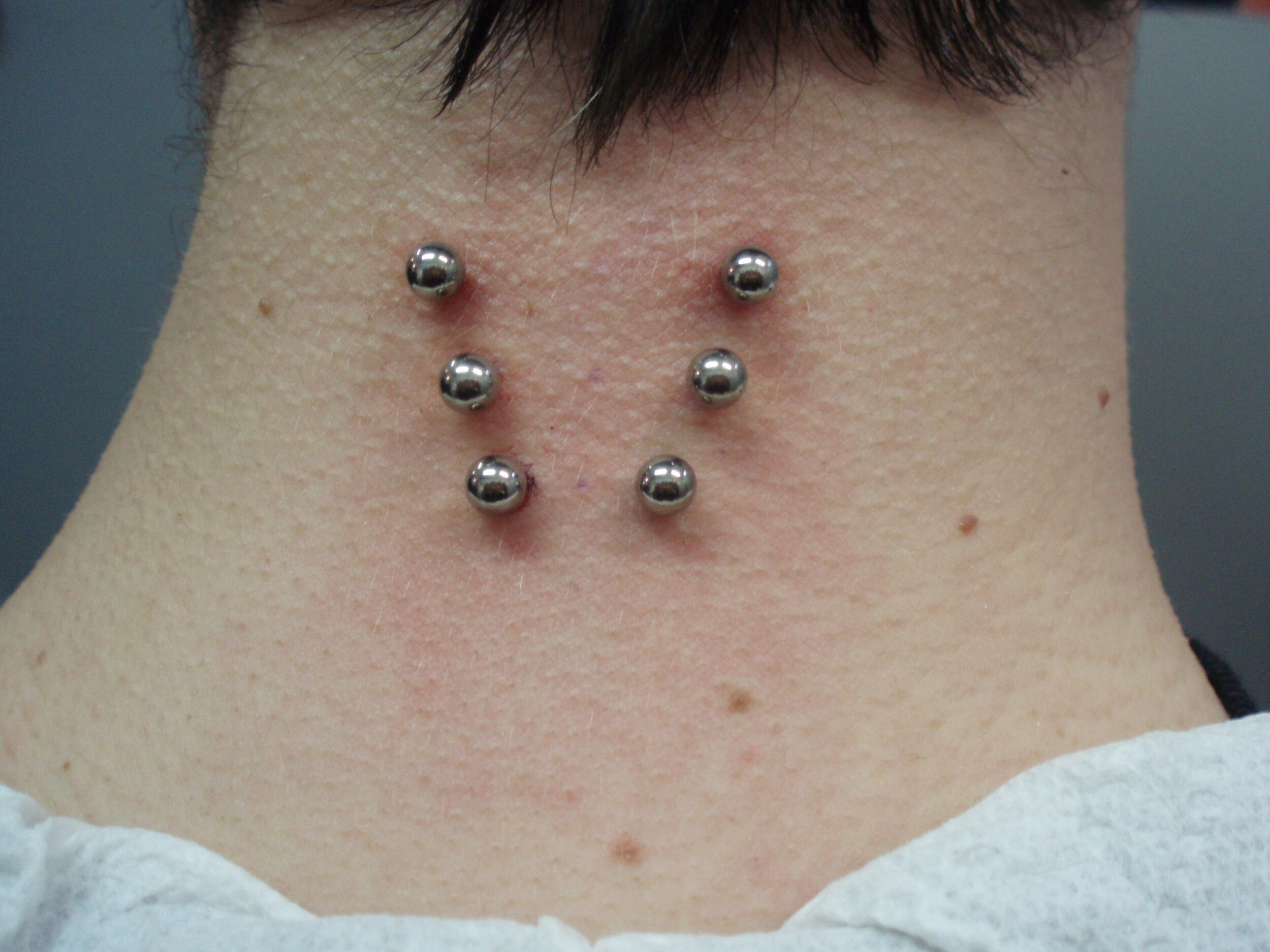 triple neck piercing.JPG