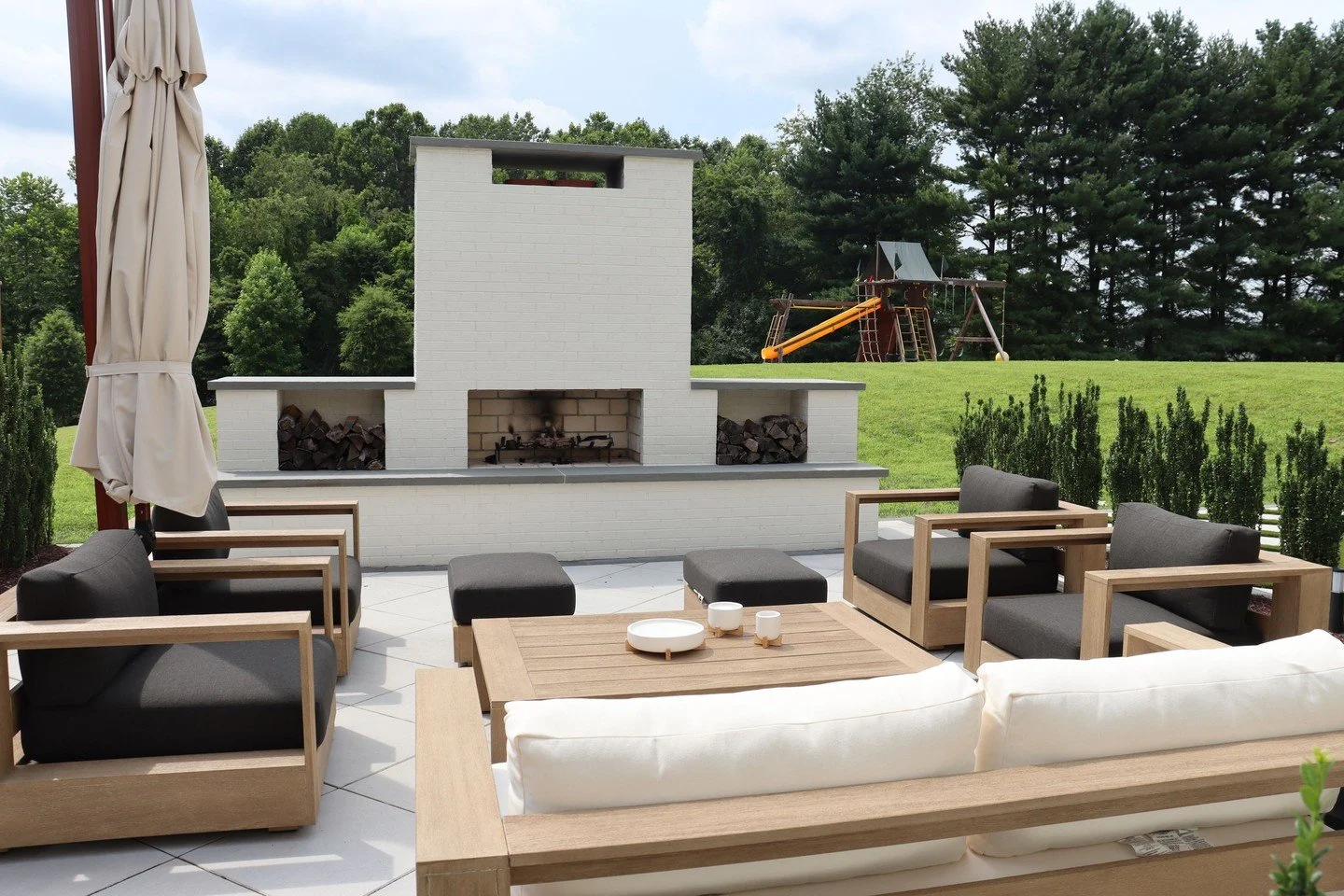 Family time in the fire light? Yes, please! ❤️
.
.
.
The beginnings of your backyard oasis are one call away! Schedule your FREE consultation with Oasis in our bio today.