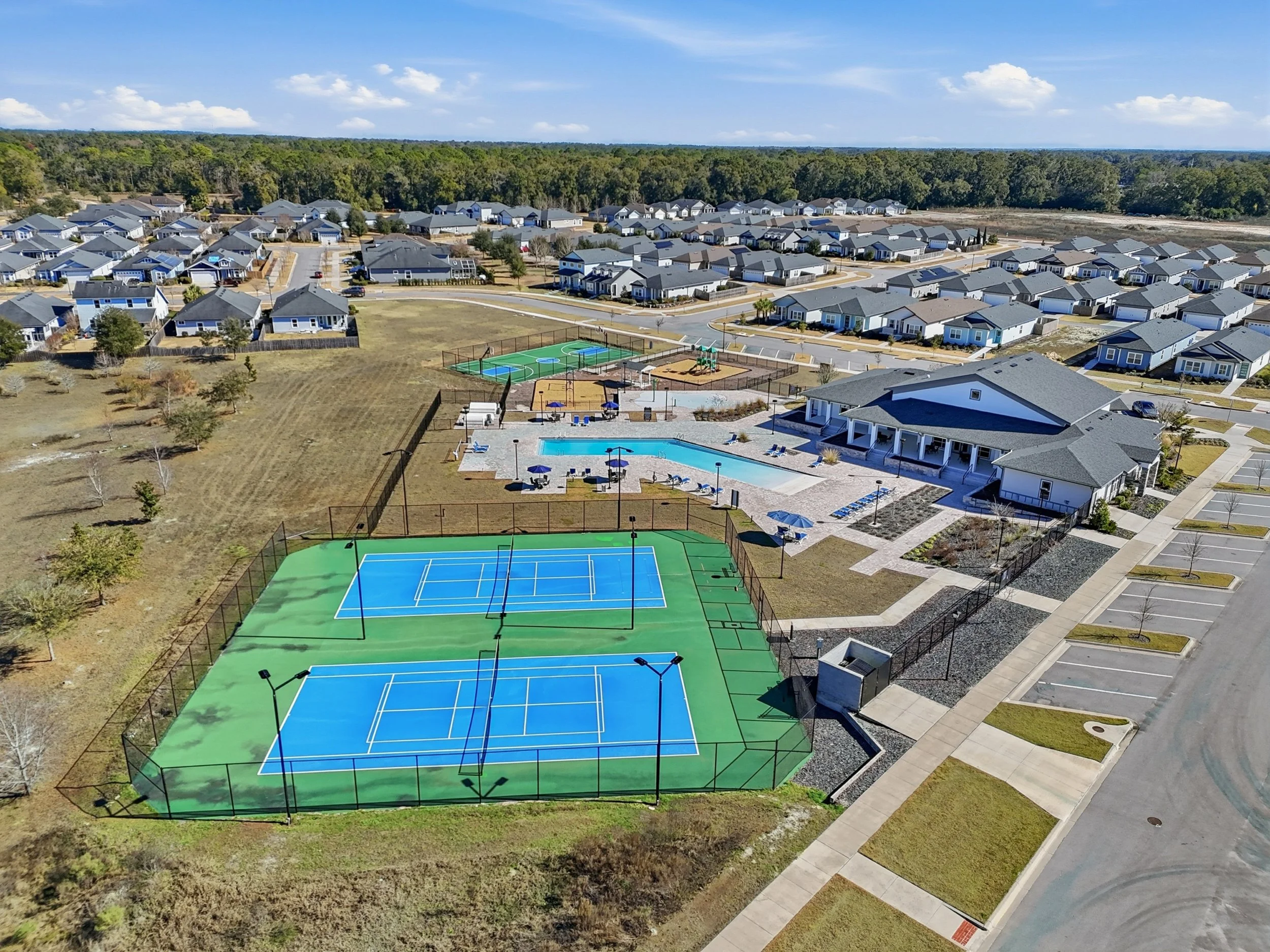Aerial view of Lugano, an Emmer Development Community, and it's clubhouse and amenities.