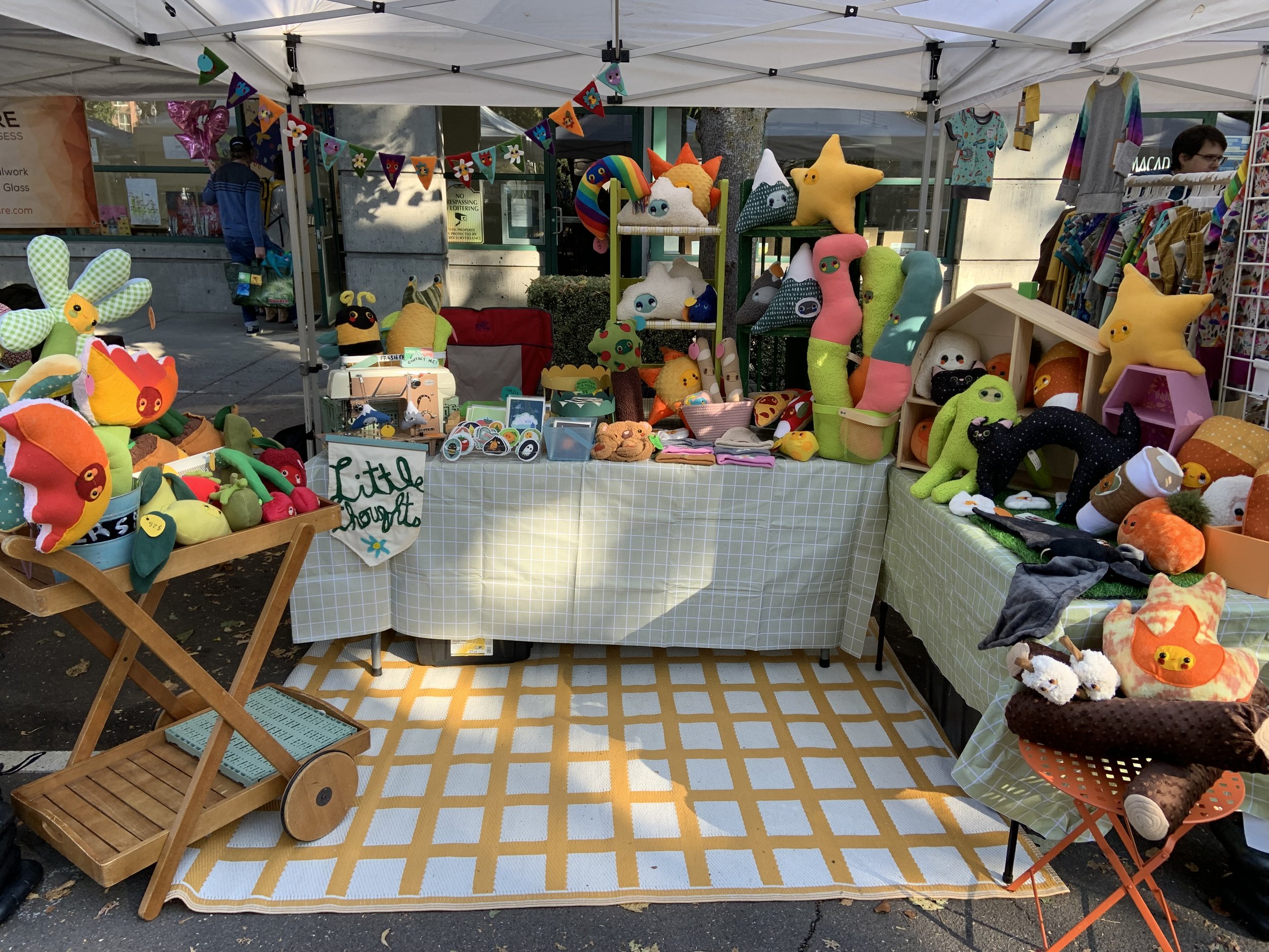 Colorful display of stuffed animals at the Little Thoughts vendor booth and the Vancouver Farmer’s Market