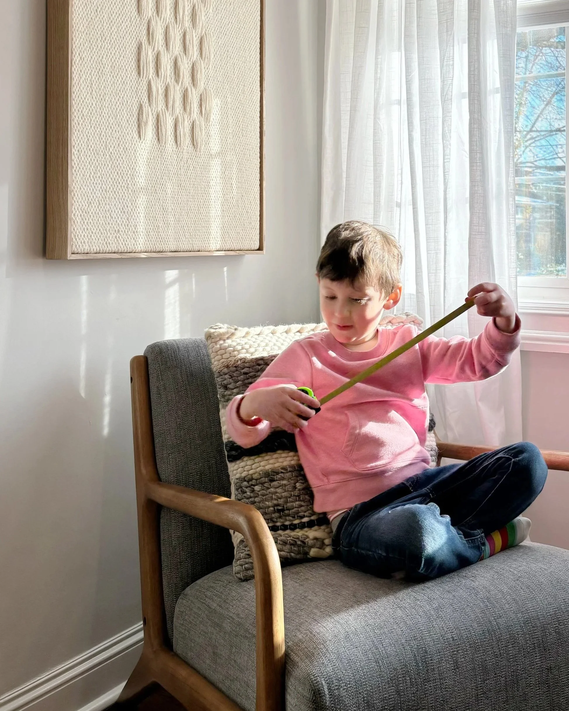 Neutral home with handmade artwork in Westchester County, NY