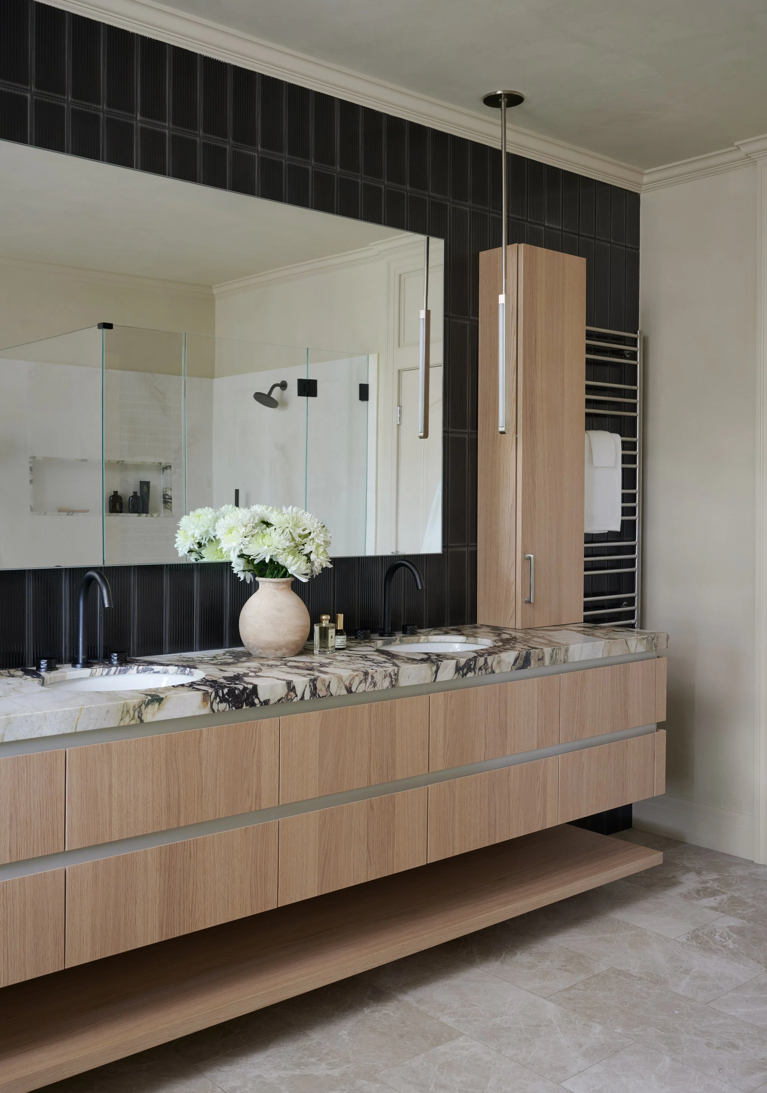 Newton Interior Renovation Primary Bathroom Vanity view 2 After Helios Design Group.jpeg