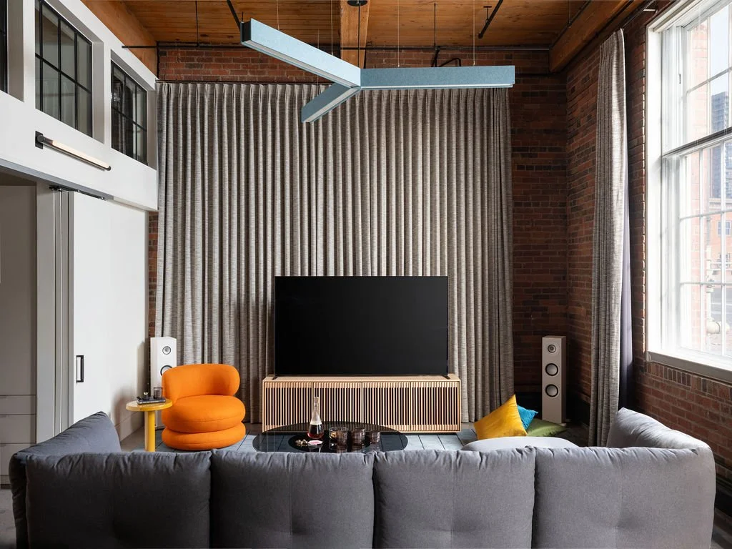 Living Room Shades Closed Reclaimed Factory Loft Denver-HELIOS DESIGN GROUP.jpg