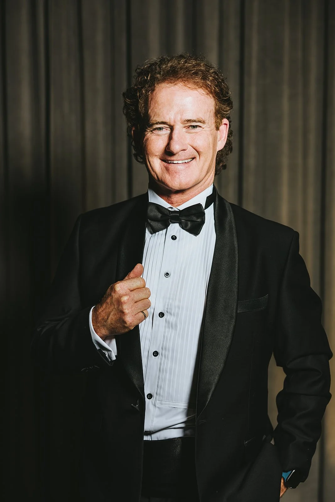 Groom in a tux on his wedding day Photo by Fedora Media.jpg