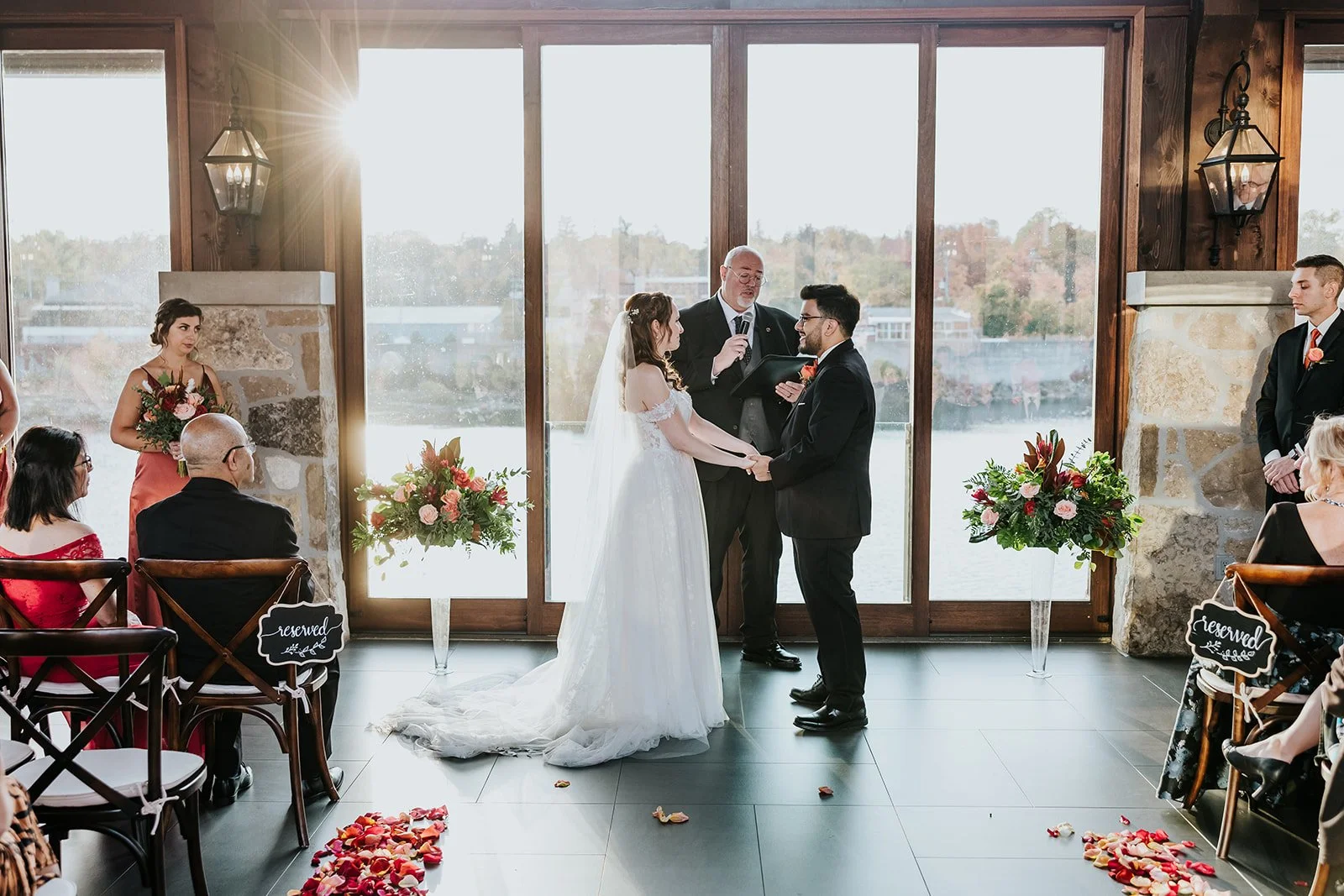 Bride and groom getting married at the Cambridge Mill.jpg