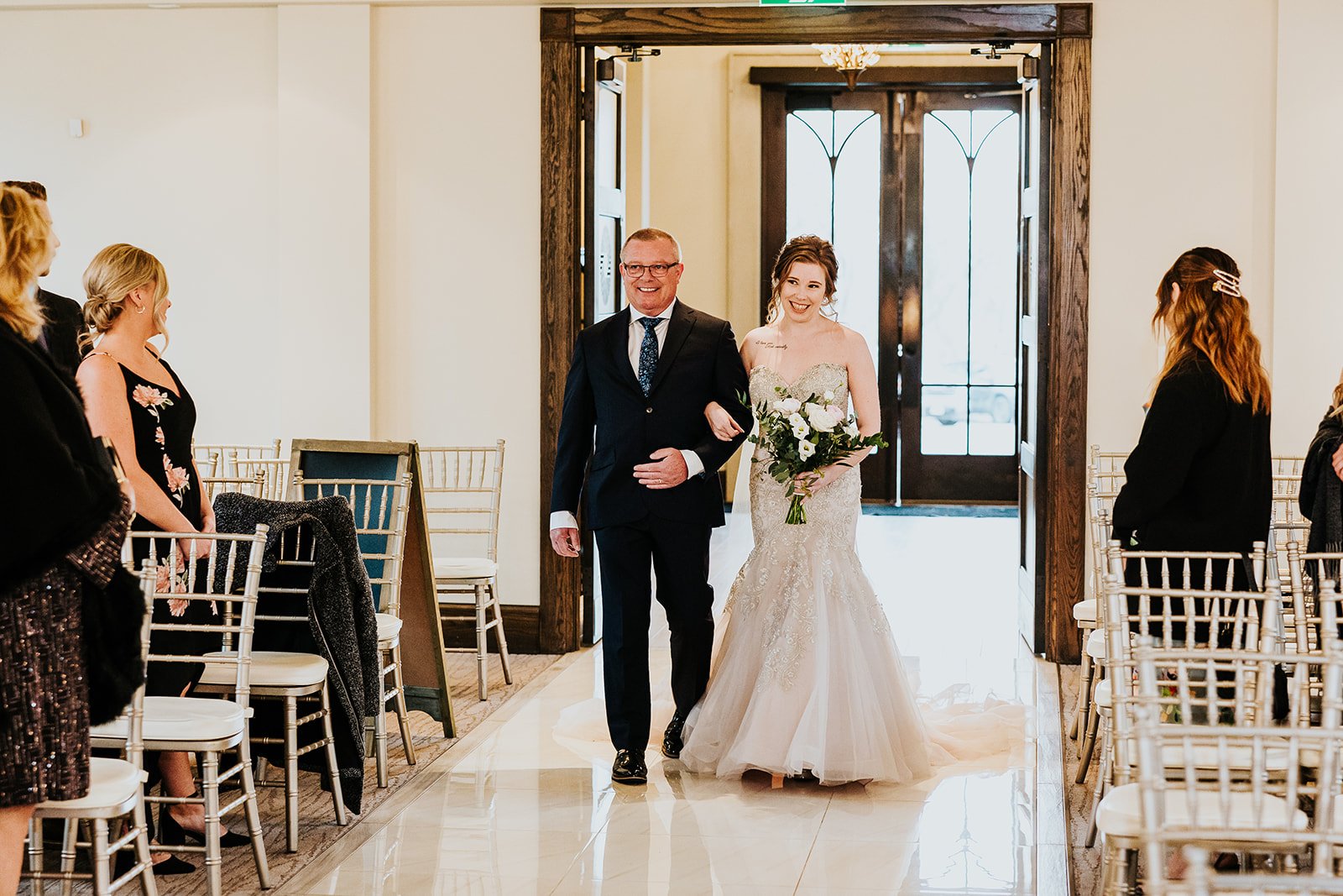 Father walks the bride down the aisle at the Ancaster Mill photo by Fedora Media.jpg
