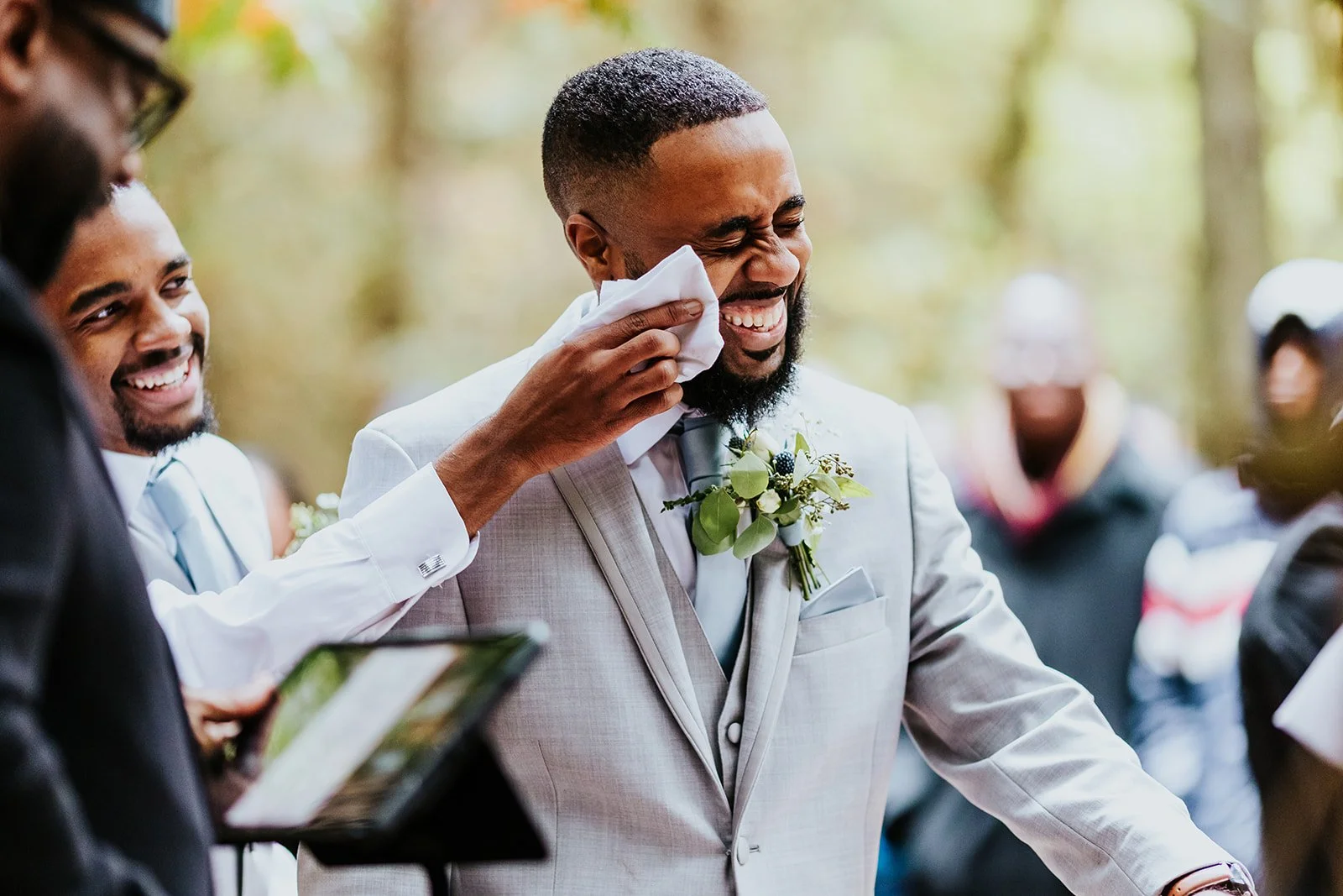 Best man wipes tears away for groom photos by fedora media.jpg
