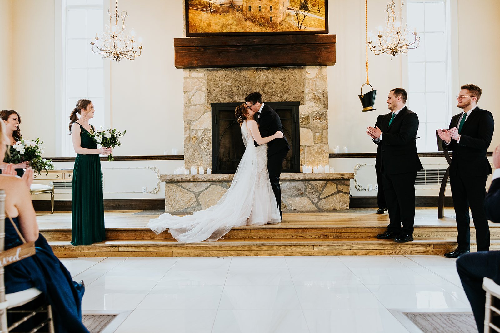 Bride and grooms first kiss at the Ancaster Mill photo by Fedora Media.jpg