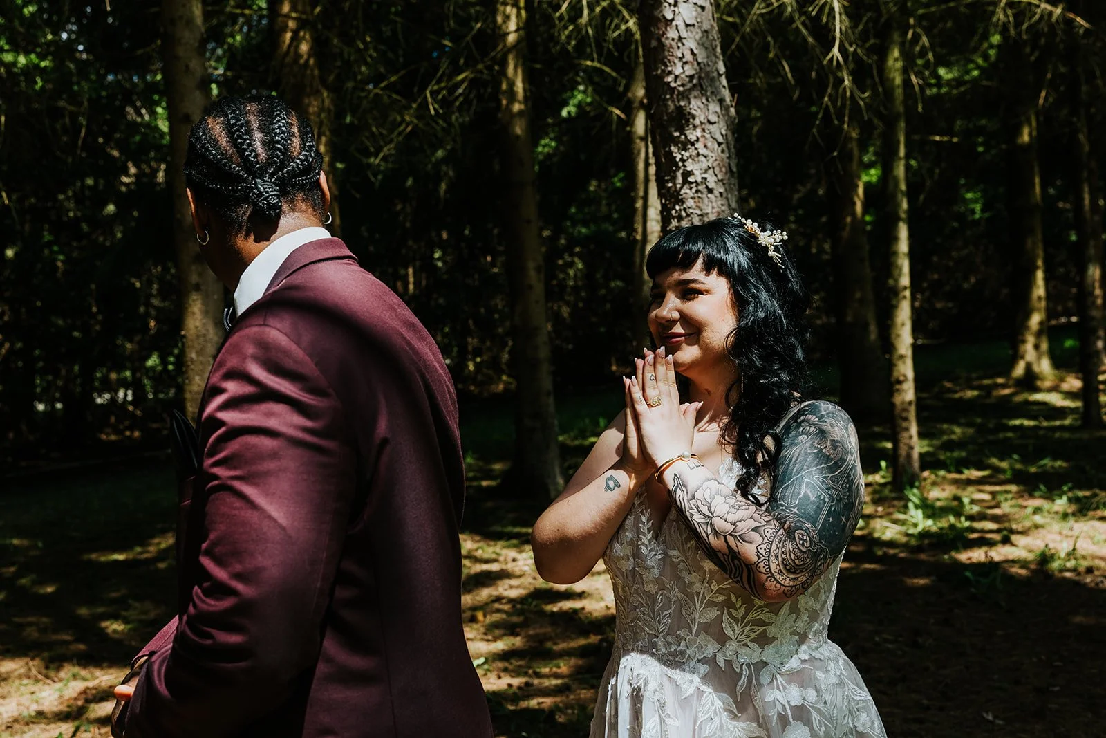 Bride overjoyed at first look in the woods at Erin Estate photo by Fedora Media.jpg