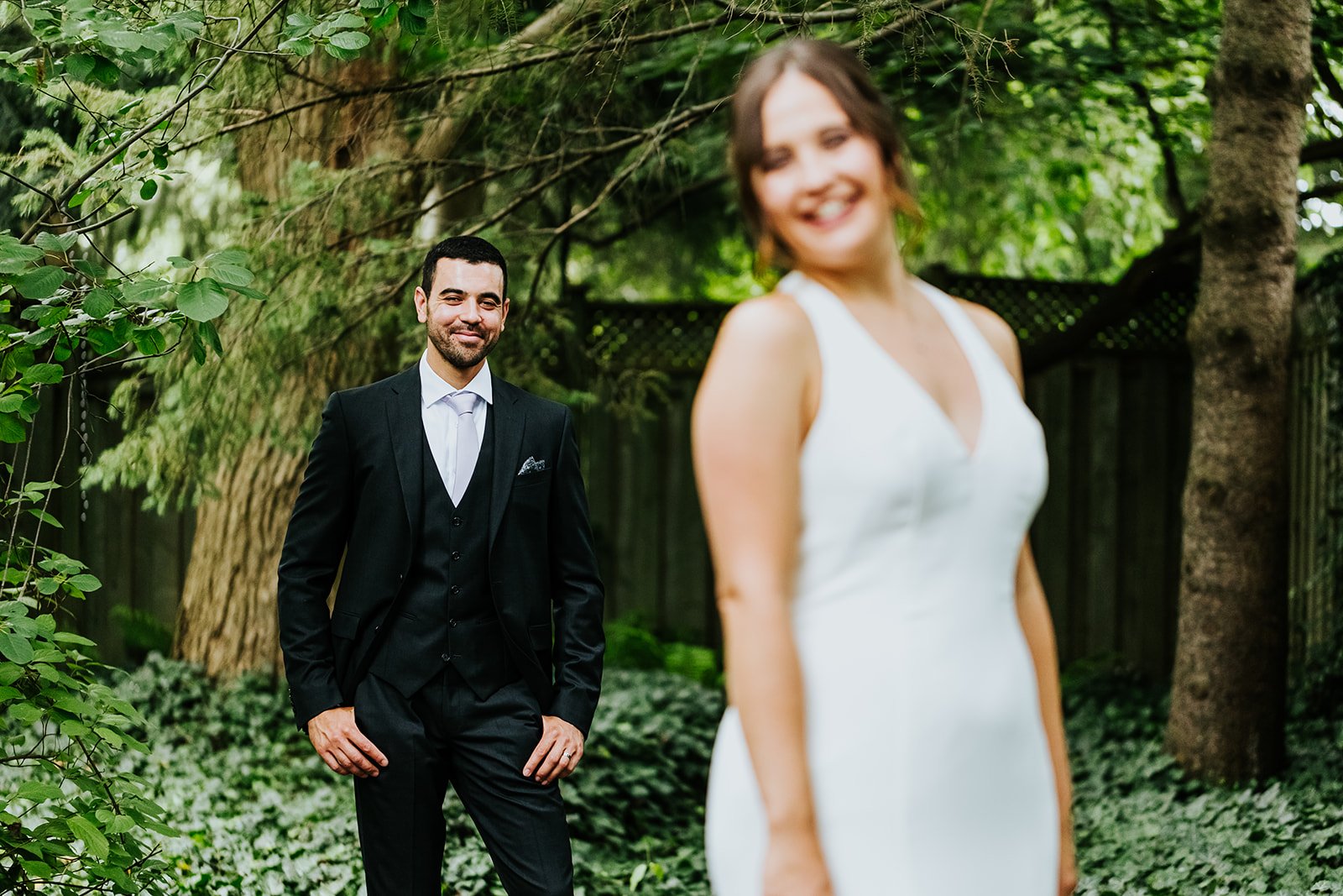Groom looking at beautiful bride photo by Fedora Media.jpg