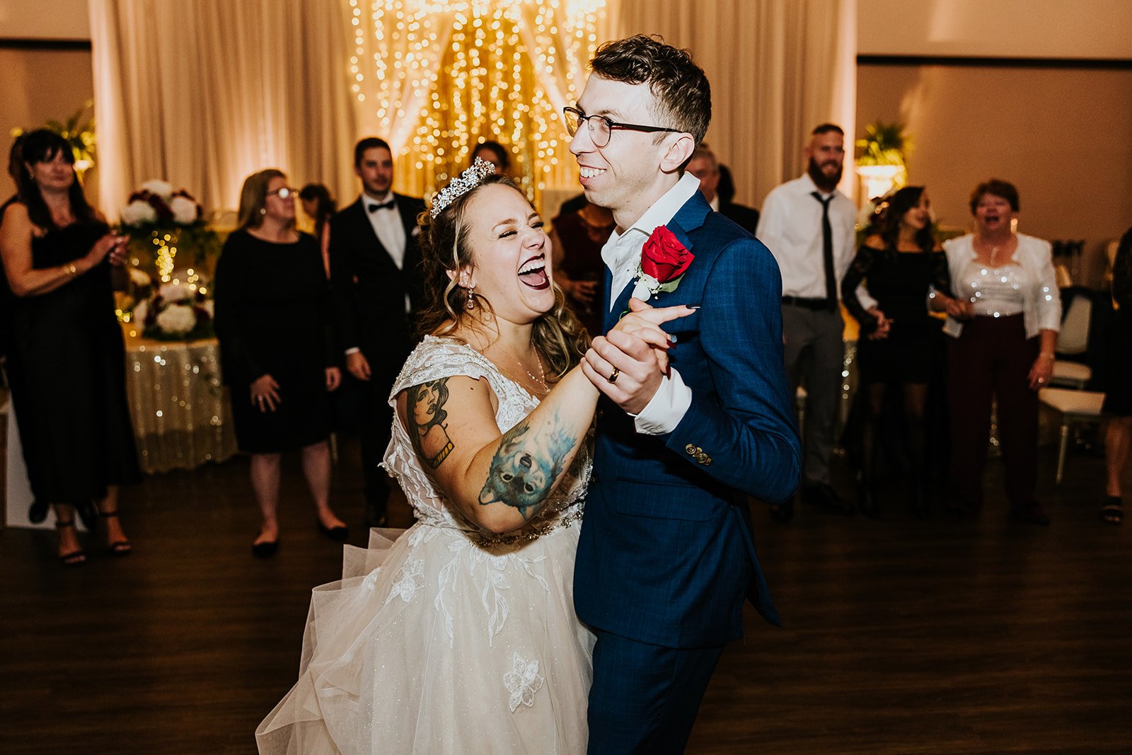 Bride and groom dance and laugh at Carmon Hotel in Hamilton photo by Fedora Media.jpg