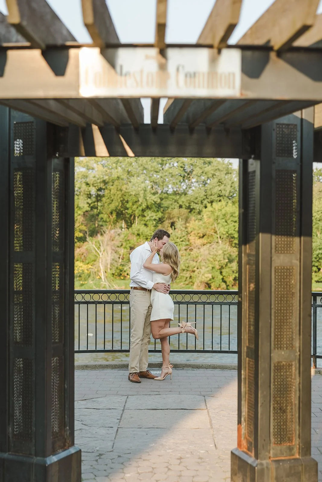 Couple Share Kiss By River Fedora Media Paris Ontario.jpg