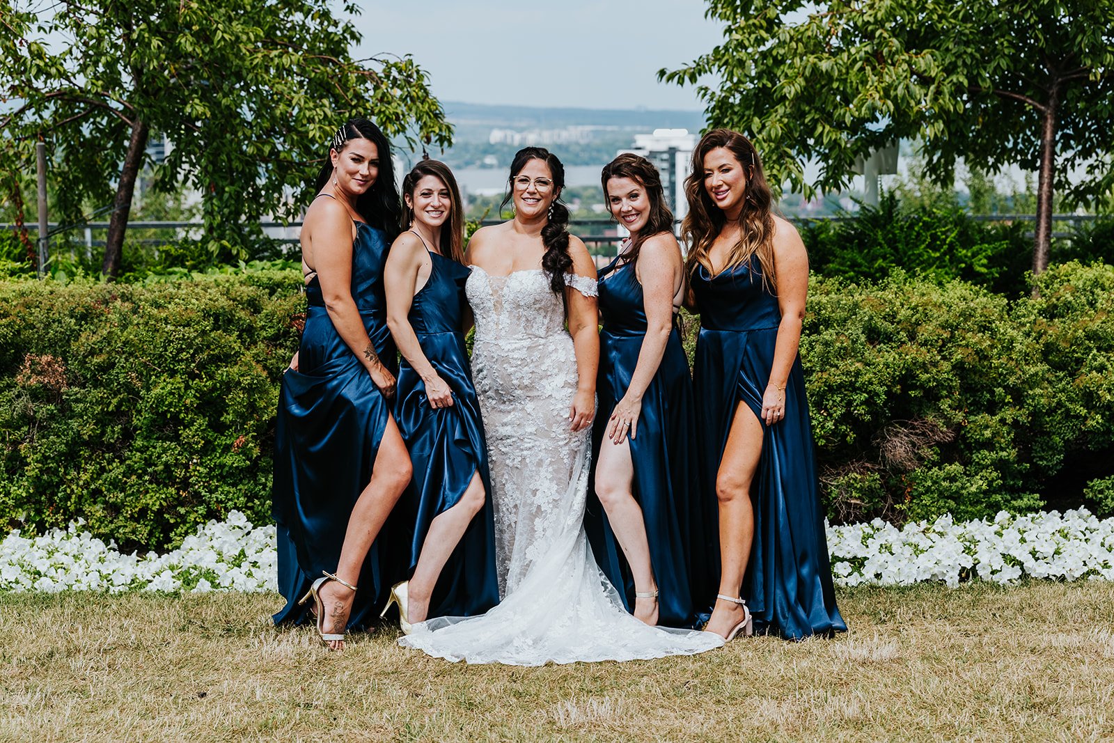 Bride with bridesmaids in blue dresses in Burlington photo by Fedora Media.jpg