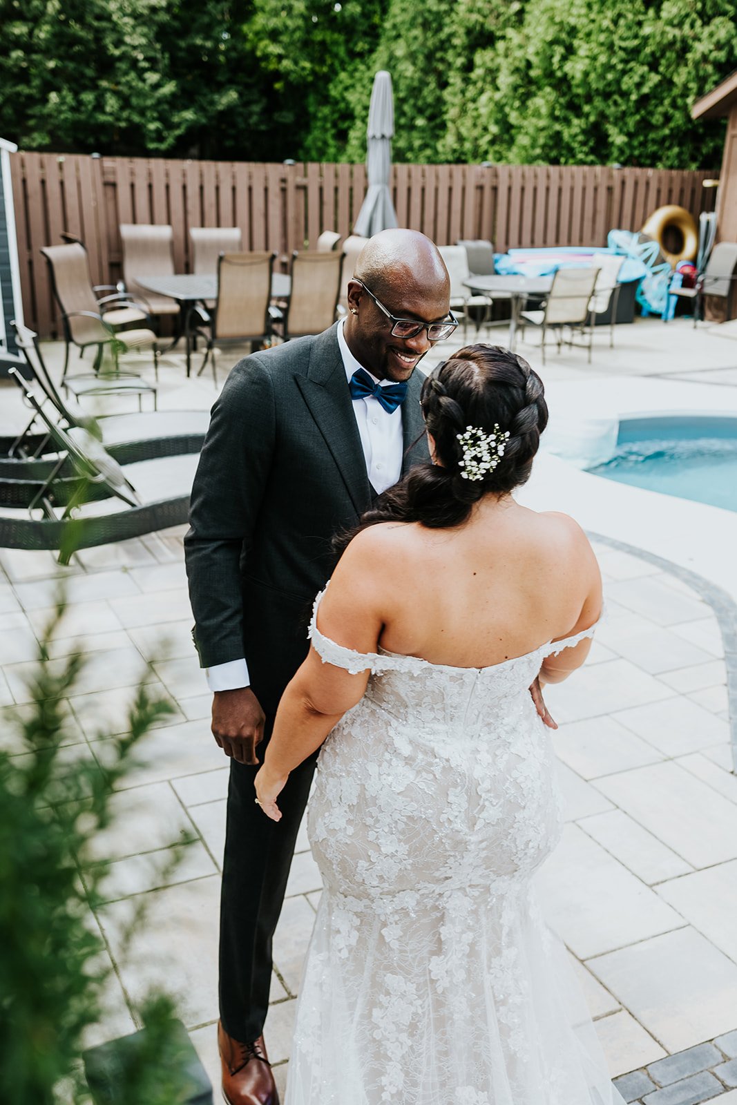 Happy couple enjoying a first-look photo by Fedora Media.jpg