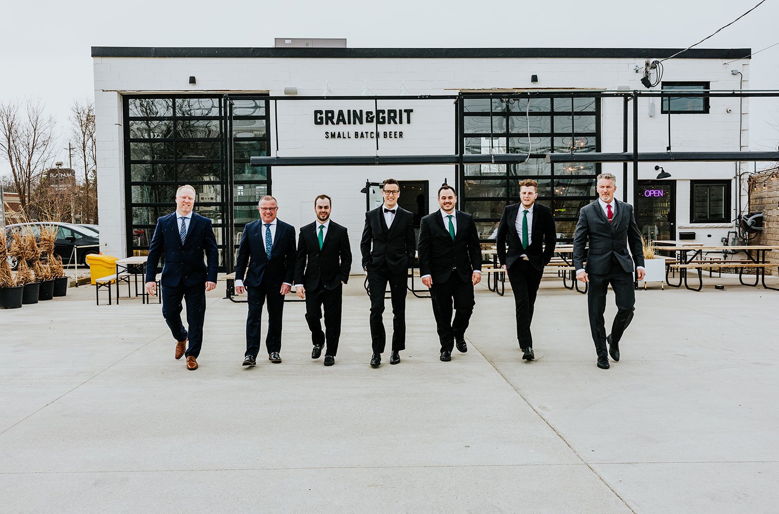 Groom and groomsmen epic walking shoot at Grain and Grit Brewery photo by Fedora Media.jpg