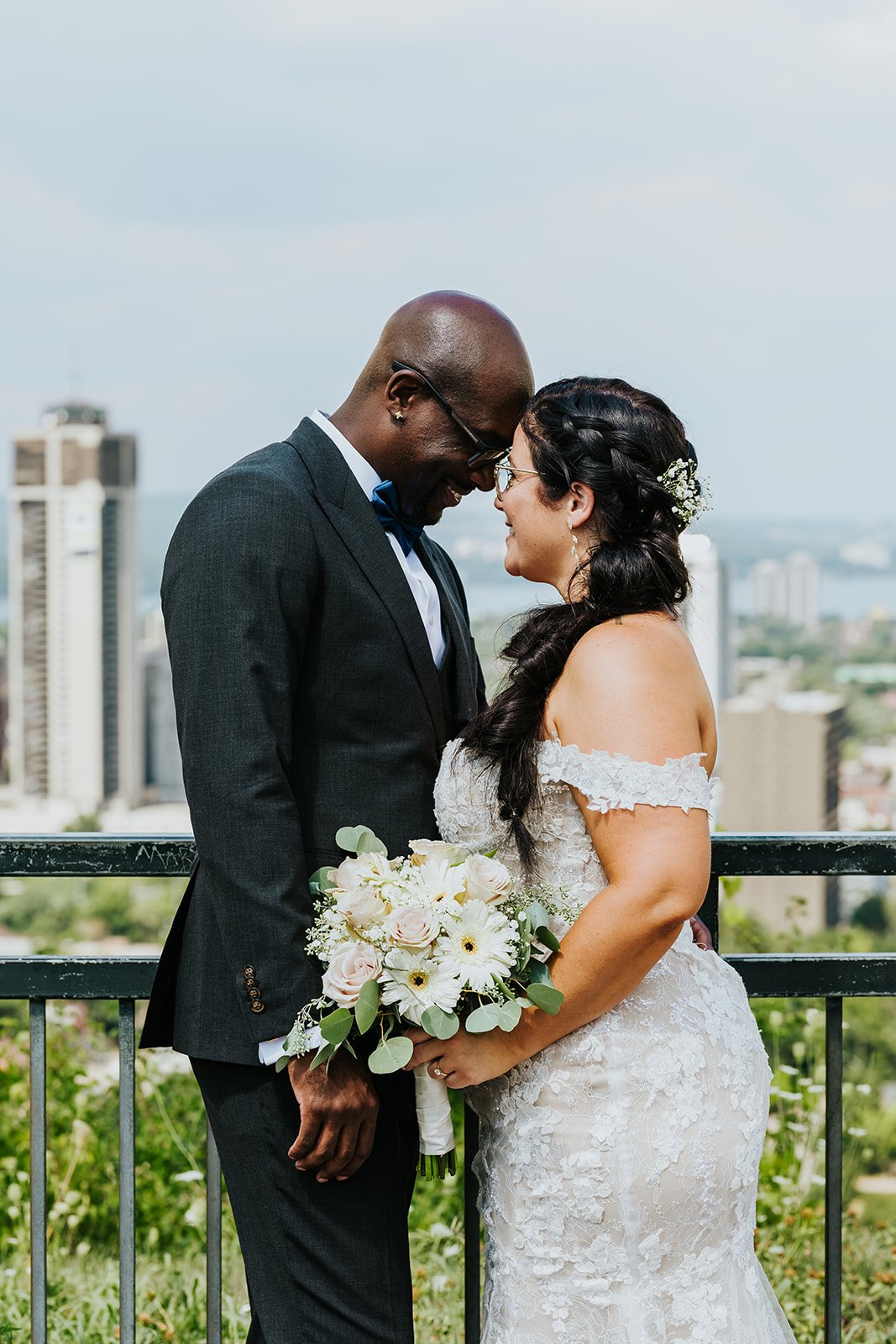 Bride and groom enjoy the Burlington skyline photo by Fedora Media.jpg