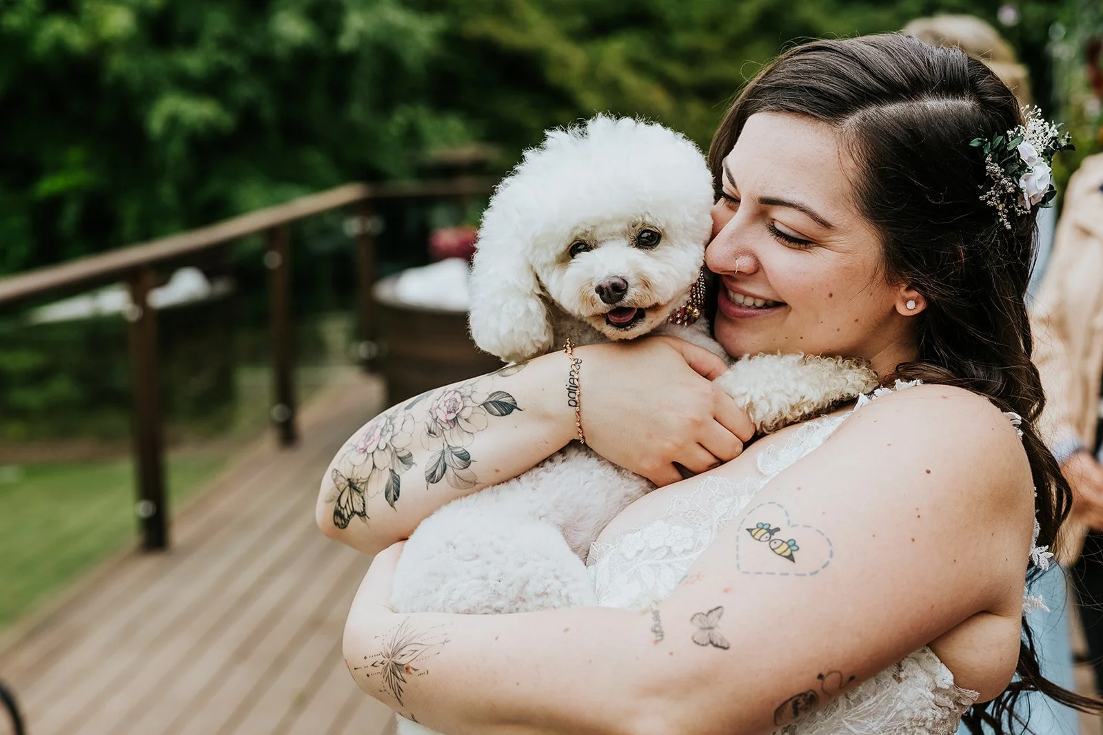 Bride cuddles poodle fur baby at Erin Estate photo by Fedora Media.jpg