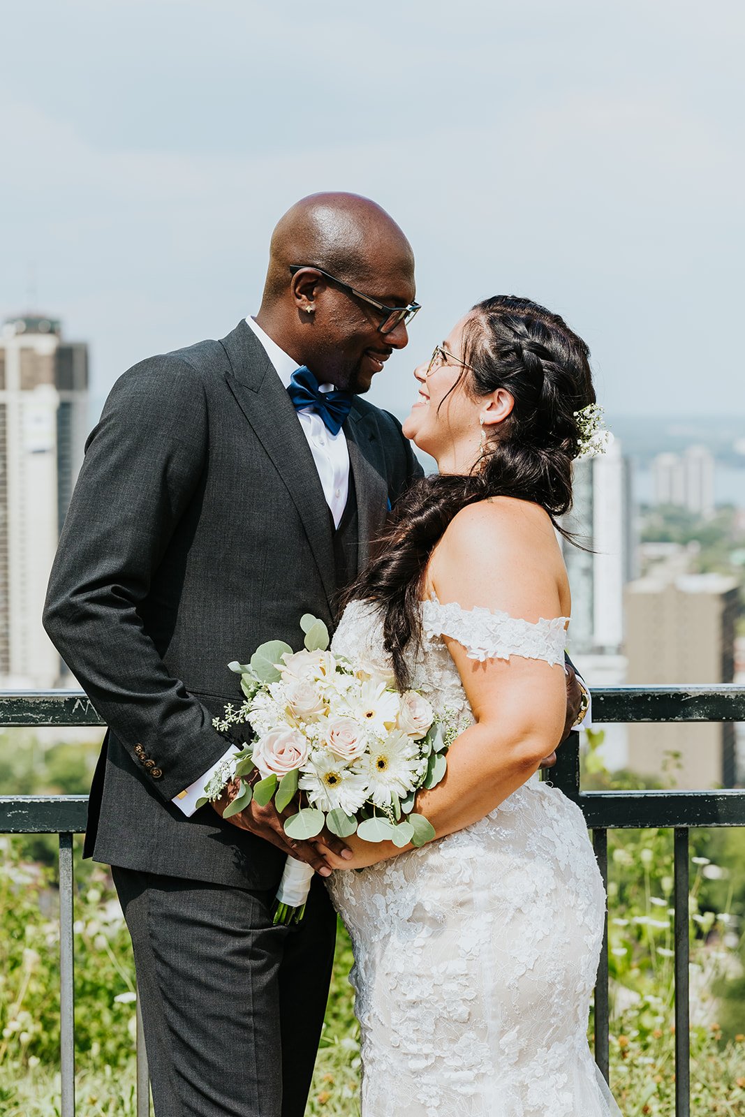 Bride and groom candid moment in Burlinting photo by Fedora Media.jpg