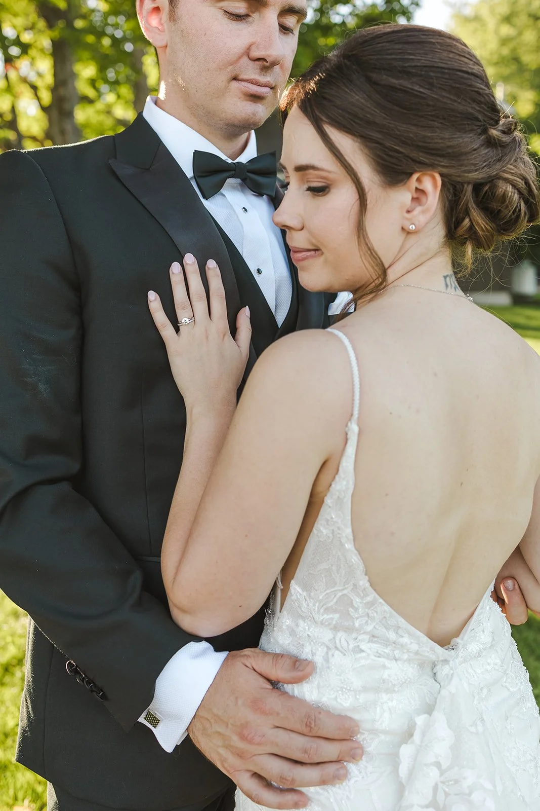Bride Embraces Groom  Fedora Media  Backyard Wedding.jpg